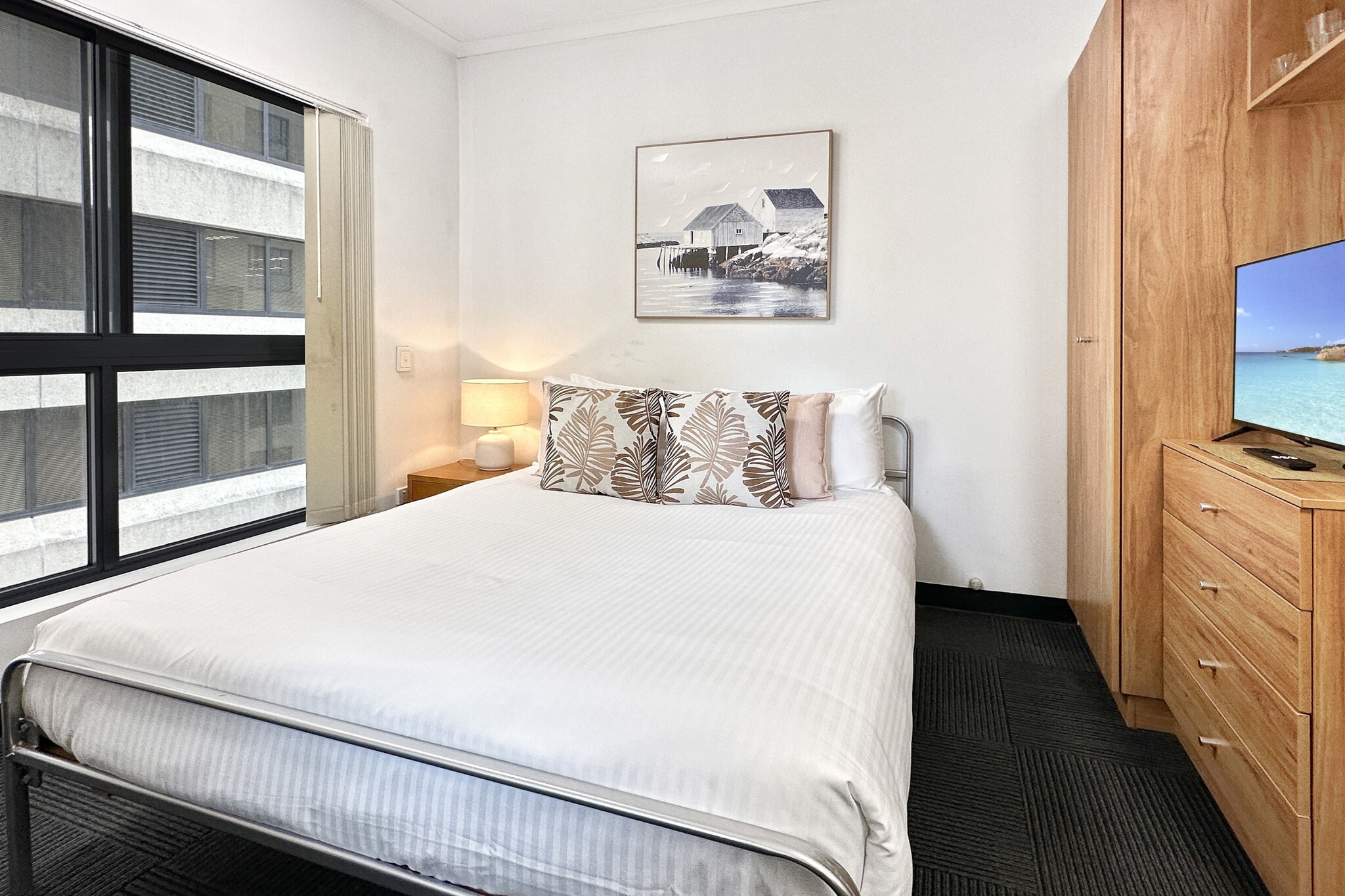 Property description
Located in Brisbane's bustling CBD, this stylish studio offers a cosy retreat with all the essentials. Enjoy access to shared amenities including a kitchen, dining area, and media room. Ideal for solo travellers or couples, it features self-check-in via Ezymart just steps away. A peaceful stay in the heart of the city.
The space
Step inside this cosy studio where comfort and convenience come together in a thoughtfully styled space. The carpeted living area offers a relaxing atmosphere, complete with a smart TV for your entertainment. A dining table for two allows for easy meals in, while the well-equipped kitchenette includes an electric stovetop, microwave, fridge, coffee machine, and essential cooking utensils to suit every culinary need.
 
The bedroom area features a comfortable double bed fitted with a mattress protector, quality linen, and blackout blinds for restful nights. Bedside tables and lamps add to the functionality, with ample storage and wooden coat hangers provided.
 
The modern bathroom includes sleek fixtures, a hairdryer, and a small bin. Guests also have access to communal laundry, kitchen, and working space facilities.
 
With thoughtful touches and secure access, this studio is perfect for travelers looking to explore Brisbane from a central location, while enjoying a calm and comfortable place to unwind.