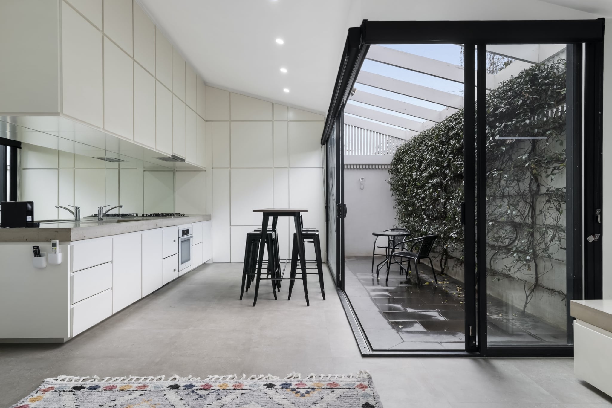 Property description
Located in the heart of South Melbourne, this spacious two-bedroom house features stylish interiors, bright living spaces, and self-check-in via lockbox. A charming front yard and open-plan design make it ideal for short escapes or longer stays. Step outside to cafÃ©s, parks, and markets, with a tram right outside your door for easy city access.

The space
Step through the private front entrance into a bright and welcoming home, where comfort meets functionality. The living area features a large sofa, coffee table, and smart TV, ideal for relaxed evenings in. Adjacent is a generous dining space with seating for eight, seamlessly flowing into a modern kitchen equipped with a gas stovetop, electric oven, and a coffee machine that fits compatible capsules.
 
Outdoors, unwind in the fully furnished patio or prepare meals in the connected kitchen to the outdoor space. The overall design is spacious and modern, ideal for families, couples, or professionals.