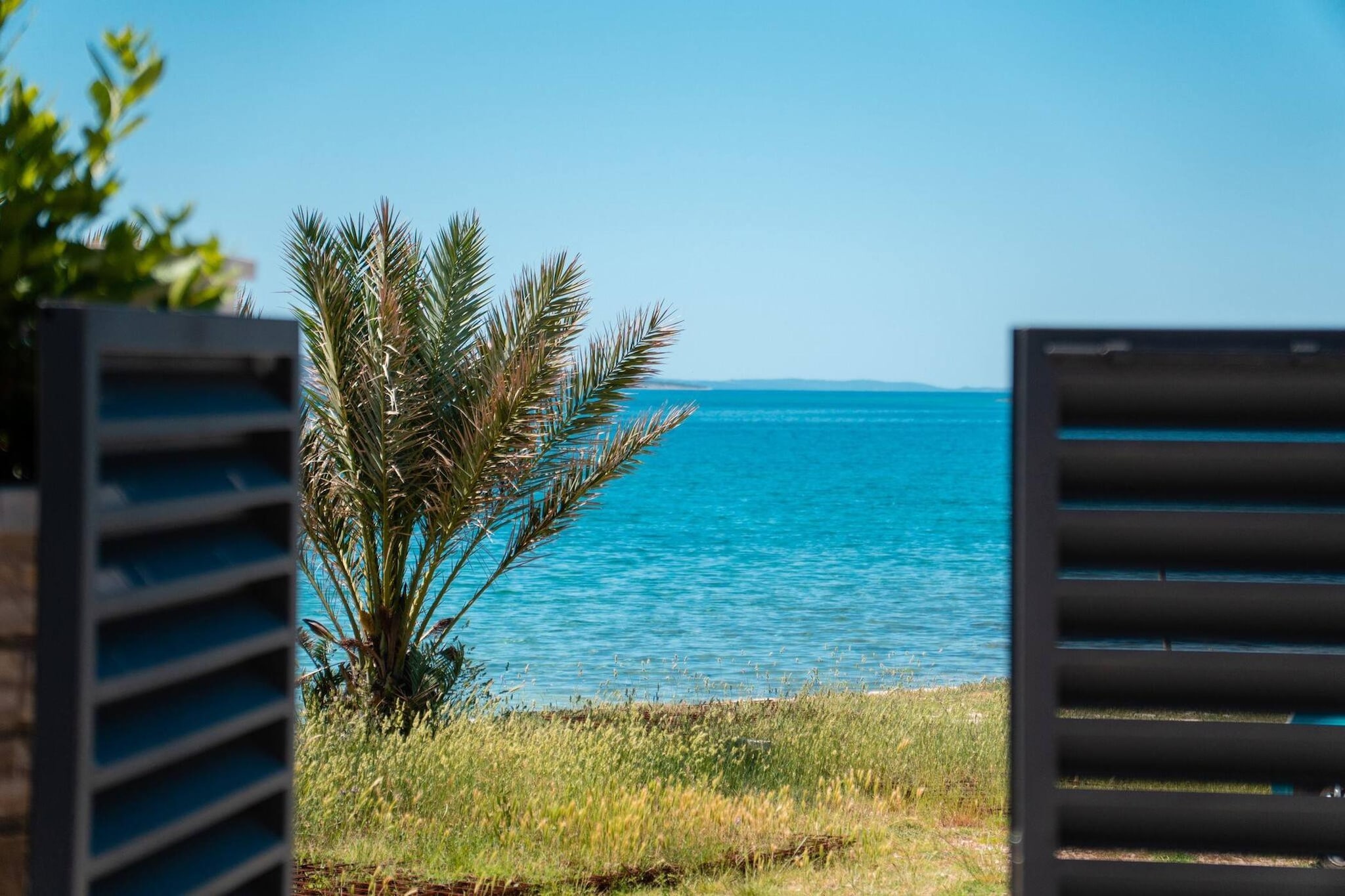 Beach house Festini-Uitzicht zomer