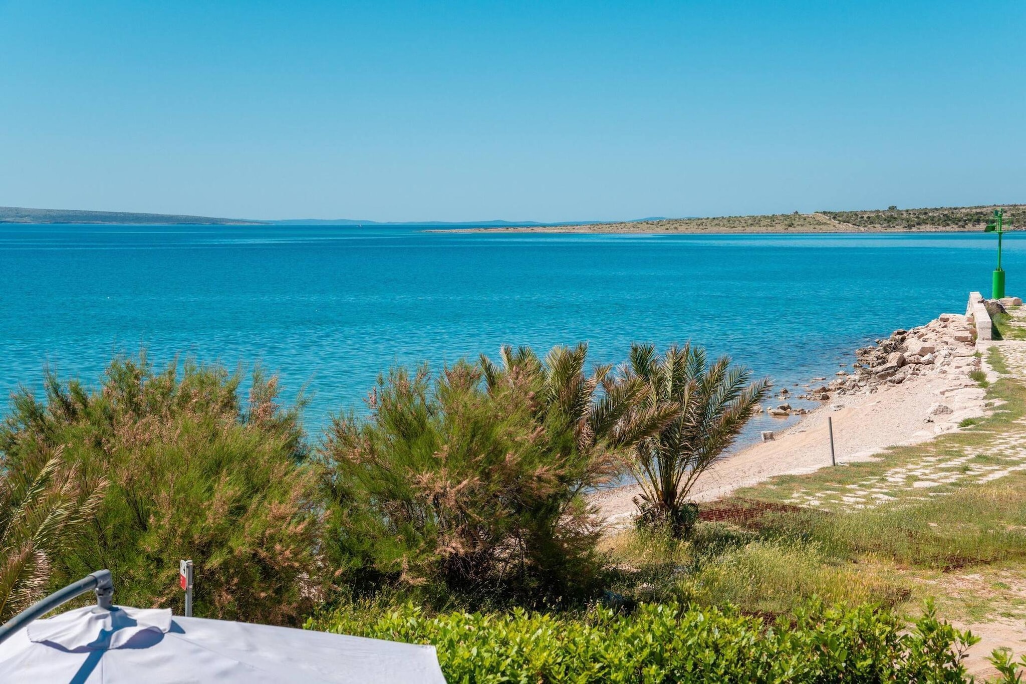 Beach house Festini-Uitzicht zomer