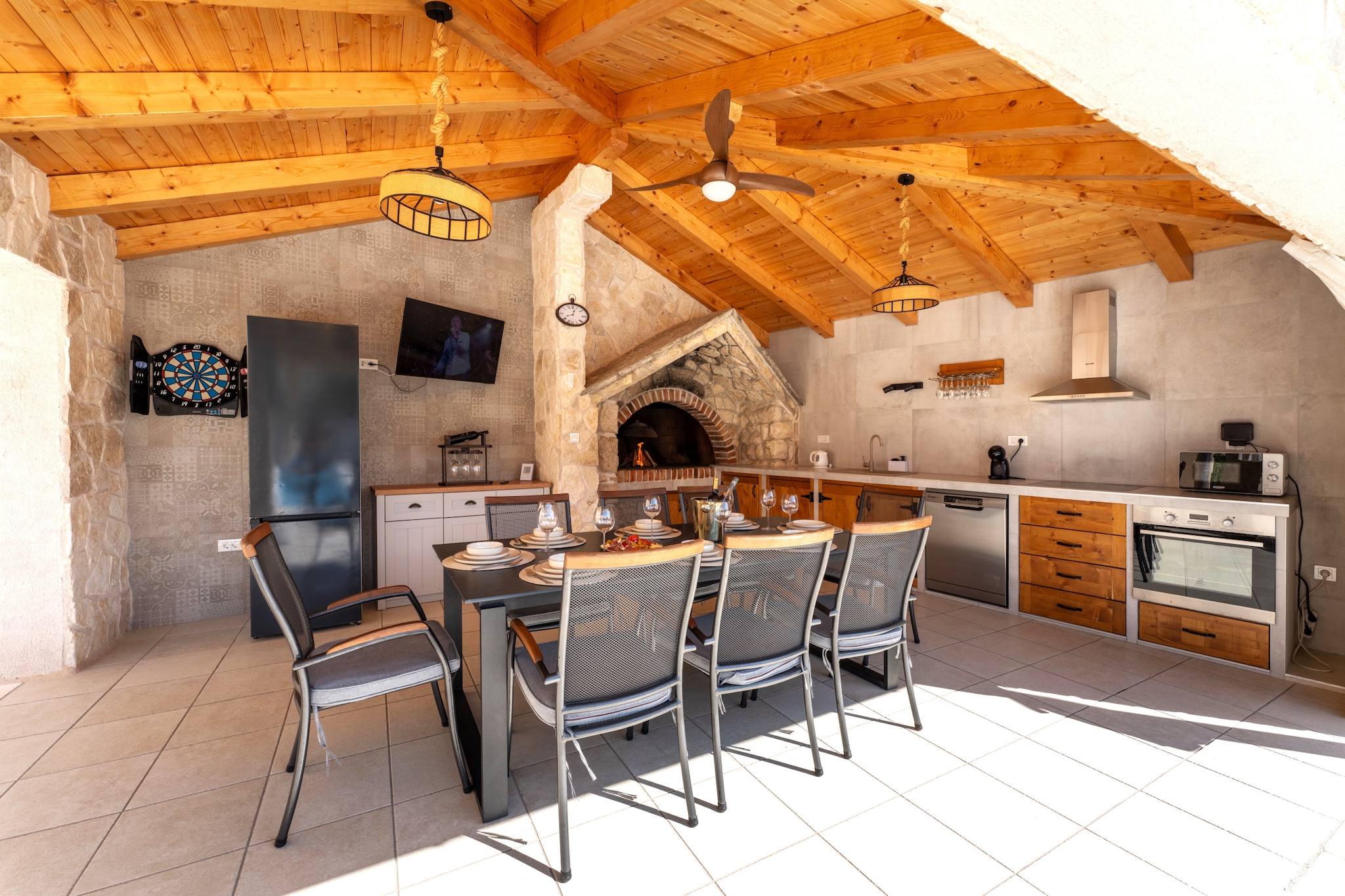 The house in Vodice has 4 bedrooms and capacity for 8 persons. Accommodation of 180 m², It has swimming pool. The property is located 0 m nature reserve, 300 m bus station, 400 m supermarket, 500 m coffee shop, 5 km the restaurant, 15 km city "Vodice", 15 km rock beach, 16 km hospital "Vodice", 25 km hospital "Šibenik", 25 km nature reserve "Nature Park Vrana Lake", 32 km nature reserve "National Park Krka", 50 km international airport "Zadar International Airport", 70 km international airport "Split International Airport", 100 km nature reserve "Nature Park Dinara" and it is located in a a family-friendly zone and in a beautiful rural area. The accommodation is equipped with the following items: garden, outdoor furniture, fenced plot, 50 m² terrace, washing machine, barbecue, fireplace, iron, internet (Wi-Fi), hair dryer, balcony, children area, gym / fitness centre, air conditioning throughout the house, swimming pool private, open-air parking in the same building, 4 electric anti-mosquito devices, mosquito nets throughout the accommodation, 2 TVs, satellite tv. The open plan kitchen, of mixed: gas and electric, is equipped with refrigerator, microwave, oven, freezer, dishwasher, dishes/cutlery, kitchen utensils, coffee machine, toaster, kettle and juicer.