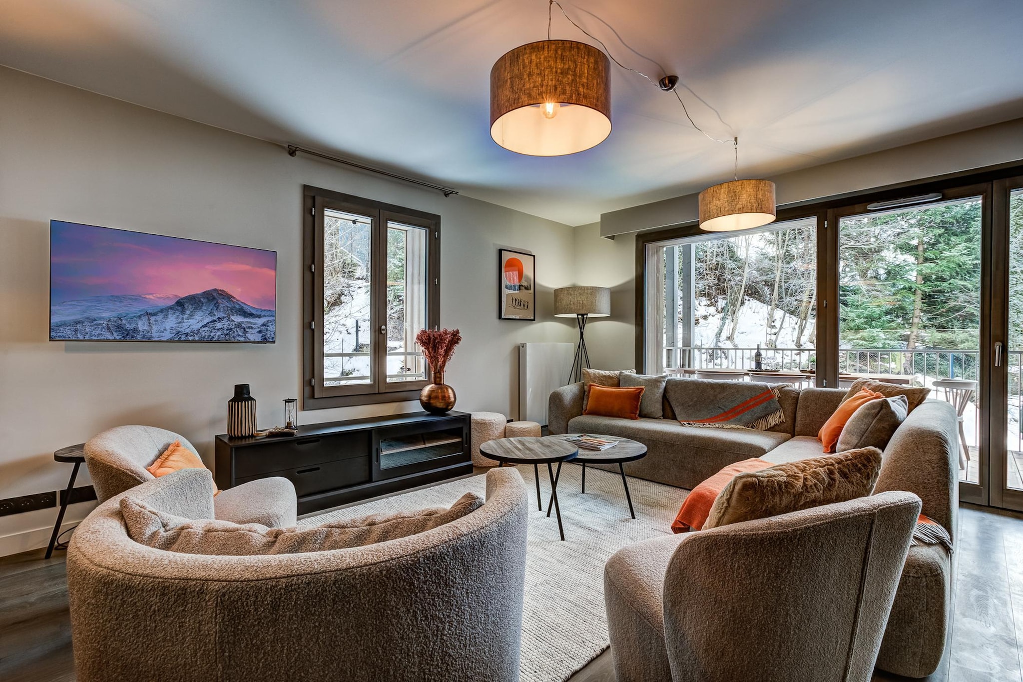 This modern 4-bedroom, 3-bathroom duplex apartment offers stylish alpine living, accommodates up to eight guests. The bright open-plan living area features large windows and a sunny, south-west-facing double-height balcony with outdoor dining furnitureâ€”perfect for relaxing while enjoying the stunning mountain views. Ideally located just 200 metres from Chamonixâ€™s main bus station, which provides access to ski areas and Geneva Airport transfers, and only a few minutesâ€™ walk from shops, restaurants, and bars.

Inside, the apartment blends contemporary design with functionality. The fully equipped kitchen includes a full-size oven, microwave, fridge, freezer, dishwasher, washing machine, and Nespresso coffee machine. Entertainment is effortless with free WiFi, a smart TV with Netflix, and a Bluetooth music speaker. Guests benefit from ski and bike storage with private boot dryers, covered underground parking with an EV charging point, and exterior parking. Please note that pets, including dogs, are not permitted.

Winter activities include skiing at Le BrÃ©vent, La FlÃ©gÃ¨re, Grands Montets, Les Houches, Vallorcine, Le Tour, St Gervais, MegÃ¨ve, Les Contamines, and Courmayeur (Italy), or ski-away trips to Crans Montana. Guests can enjoy ice skating, sledging, indoor climbing, aprÃ¨s-ski, the Aiguille du Midi cable car, Skyway Monte Bianco, the Montenvers train to the Mer de Glace and Ice Caves, the Crystal Museum, and the Tramway du Mont Blanc. In summer, enjoy hiking, mountain and road biking, rock climbing, trail running, rafting, canyoning, Acro Park, laser tag, and watersports at Lake Passy. Year-round, visit local spas, pools, or take day trips to Annecy, St Gervais, MegÃ¨ve, Courmayeur, and Aosta in Italy.