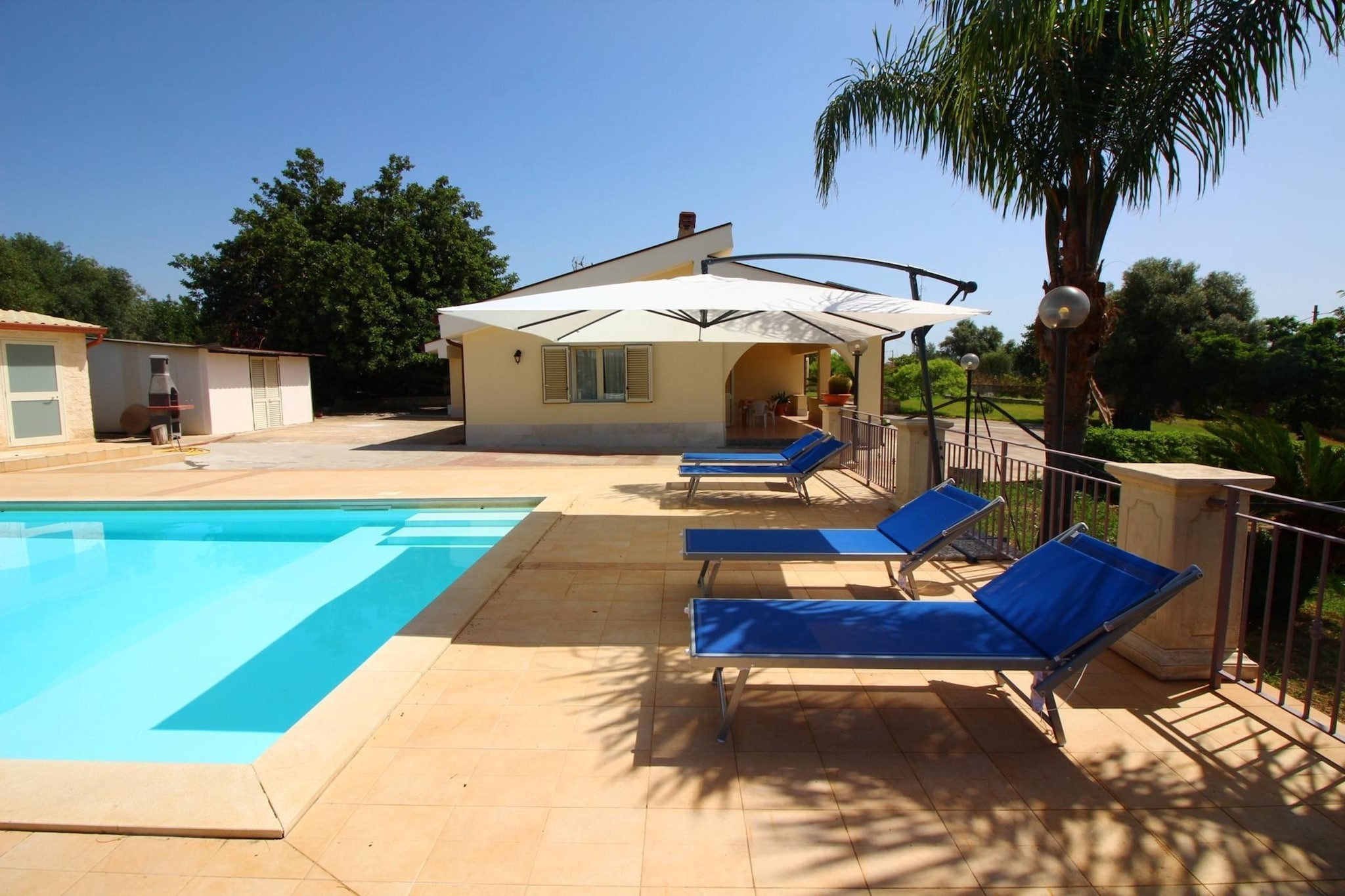 Ground floor: (Living room(TV, dining table, seating area), open kitchen(hob, electric kettle, toaster, oven, microwave, fridge-freezer, washbasin), bedroom(double bed), bedroom(single bed, double bed), bathroom(shower, washbasin, toilet, bidet), patio, air conditioning, terrace(private, roofed))\n\noven, garden(private, landscaped garden), garden furniture, sun loungers, BBQ, parking, parasol, swimming pool(private, outside, opened from May upto and including Oct)