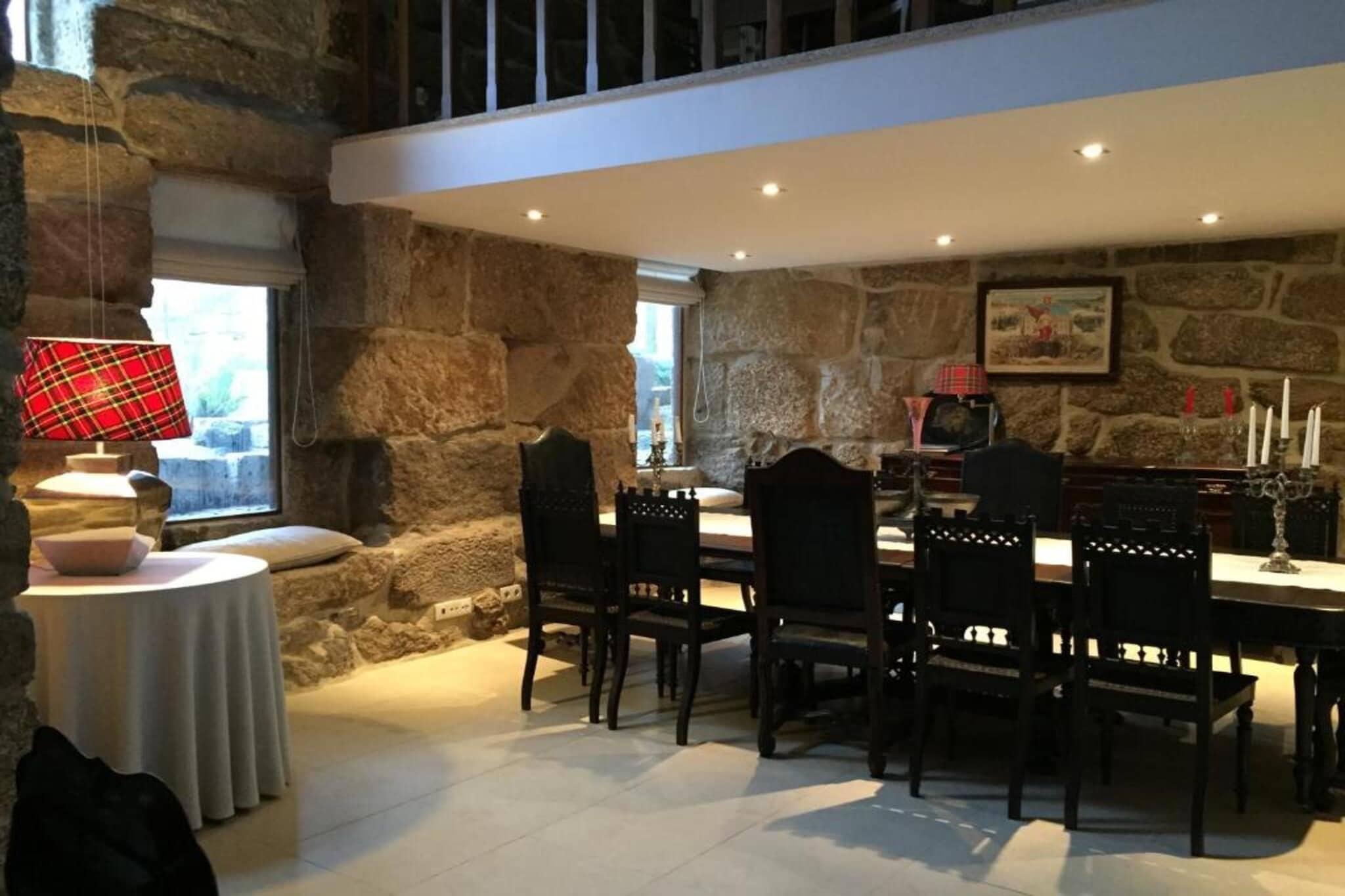 This is one of the suites at the Casa da Ventozella, ideal for a couple looking to spend their weekend in the country away from all the hustle and bustle of the urban city mess. The moment you check in, you put all your hassle away and unpack the luggage of relaxation and peace.

You get to enjoy all the modern amenities that come with the room at this elegantly converted manor house - a cozy double bed for lazing up, a private bathroom with essential toiletries, WiFi to stay updated with the world, air conditioning and heating as per the season. The house offers an array of other conveniences, too, as you can enjoy coffee and breakfast from the on-site coffee house, dine in for lunch and dinner at the restaurant or the shared dining space, relish drinks at the pool while sunbathing, or admire a sunset on the terrace. The huge, lush gardens at the premises hold a range of activities, and you can choose from the lot.

If you are planning a couple’s day out, then you should surely check out the old historic town of Penafiel for its rustic and charming architecture, rent a bike to explore the picturesque biking routes around the hills, go for wine tasting through the scenic meadows, an hour drive away or attend regular live events such as music, performances and themed dinners.

Whether this escape is a way to spend quality time with your plus one, celebrating a milestone, or just appreciating some peace of mind, Casa da Ventozella assures to offer you the space, comfort and shared moments.