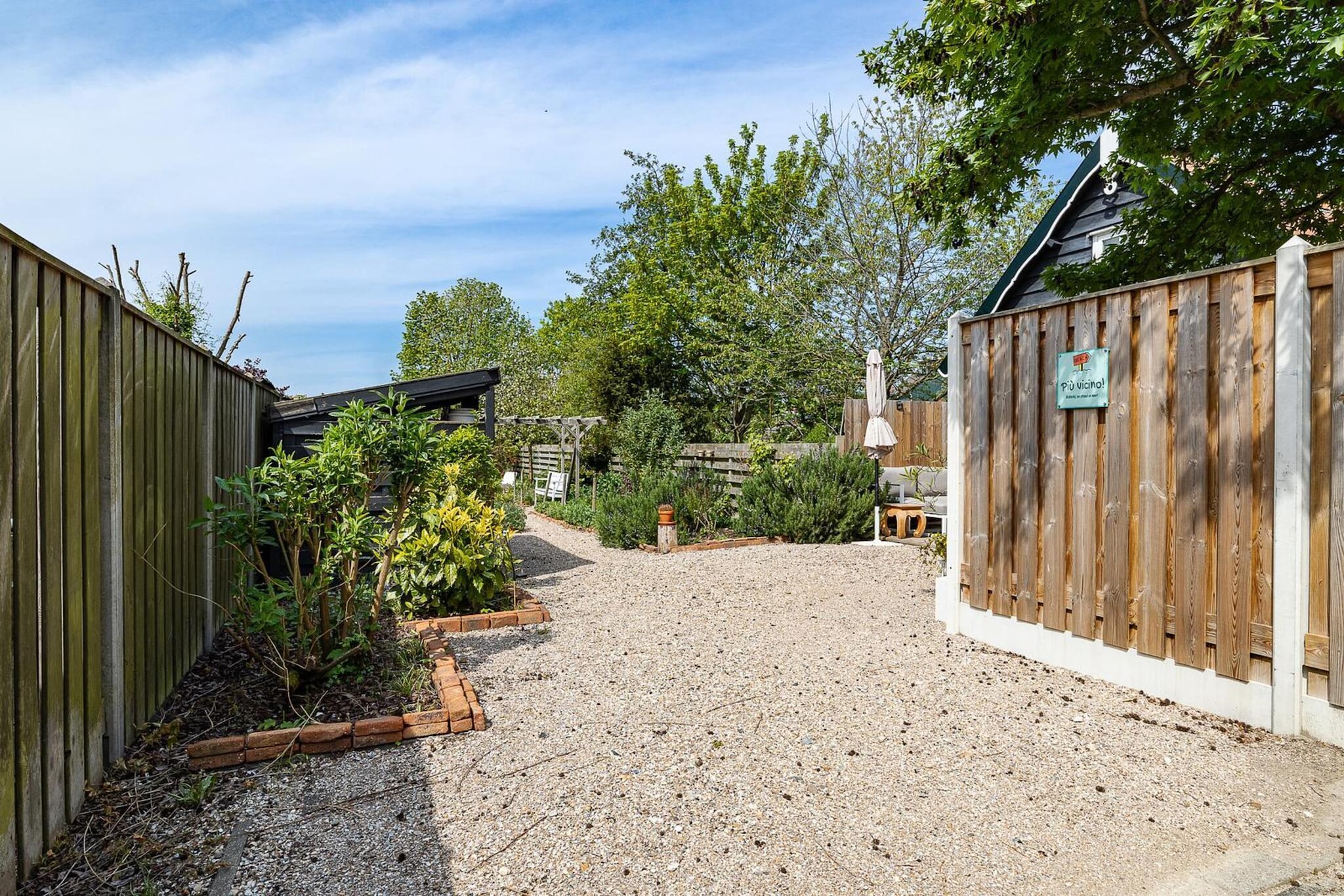Holiday home - Schoolstraat 6a | Vrouwenpolder - Gardens in summer