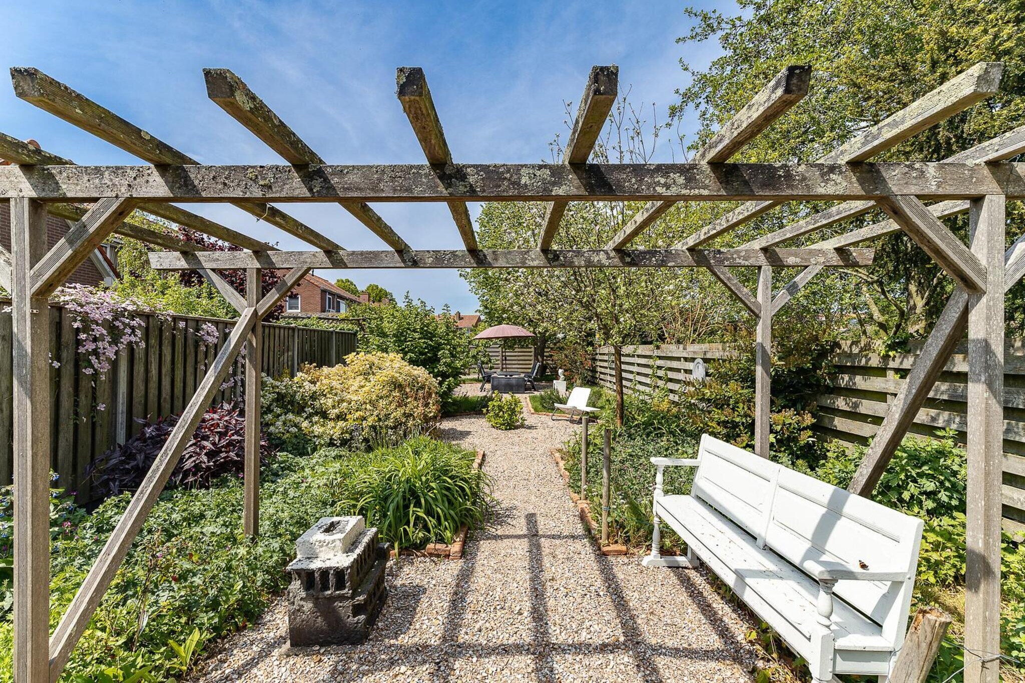 Holiday home - Schoolstraat 6a | Vrouwenpolder - Gardens in summer
