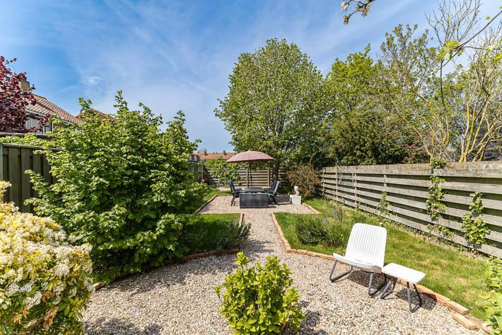 Holiday home - Schoolstraat 6a | Vrouwenpolder - Gardens in summer