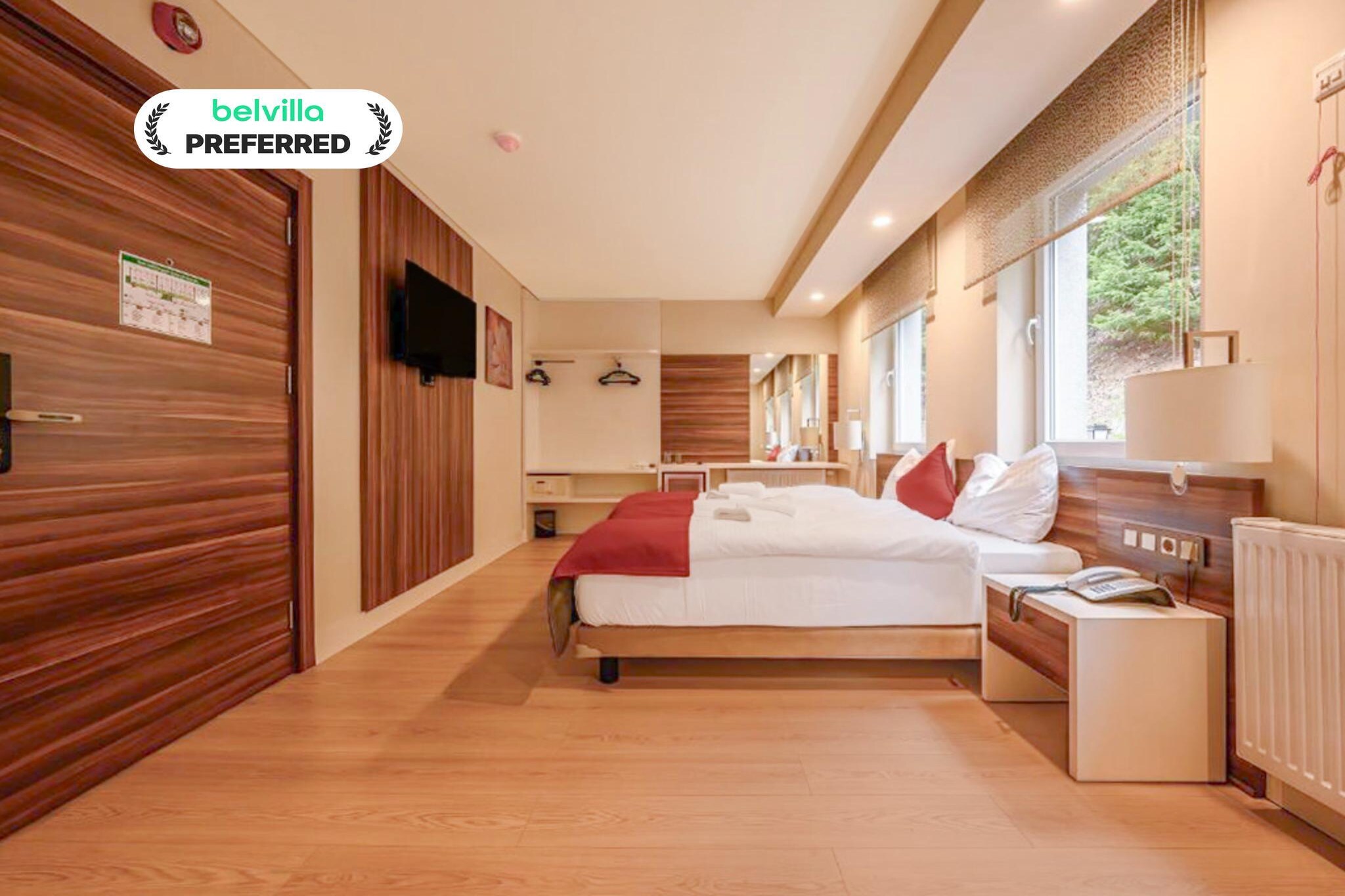 Looking for a stay where your day begins with fresh mountain air instead of traffic noise, and where accessibility doesn’t mean giving up comfort or nature? This wheelchair-accessible room at Hotel Schwarzbachtal Hideaway offers exactly that — a peaceful retreat designed for ease, comfort, and freedom.
Room Features – Wheelchair-Accessible Double Room
1. Spacious layout allowing smooth, easy movement.
2. Comfortable double bed designed for restful sleep.
3. Accessible bathroom with support features for safety and convenience.
4. Heating for winter stays and a cool, fresh environment in summer.
5. Flat-screen TV for relaxed evenings.
6. High-speed Wi-Fi for easy browsing and streaming.
7. Sofa for comfortable seating.
8. Safety deposit box for personal belongings.
9. Warm, calming décor that supports a restful atmosphere.
Hotel Amenities for Accessibility & Comfort -
1. Elevator access to rooms and common areas.
2. Designated accessible paid parking spaces (Euro 5/vehicle/day).
3. Accessible restaurant, lounge, and wellness/spa zones.
4. Friendly, attentive staff ready to help when needed.
5. Peaceful surroundings ideal for slow, relaxing stays.
6. Pet-friendly stay at 18 Euro per pet per night.
Nature & Nearby Activities -
1. Forest and mountain views just steps from the room.
2. Gentle paths suitable for accessible walks.
3. Vogtland Nature Park trails offering fresh air and quiet nature moments.
4. Nearby ski area with winter-ready facilities for seasonal visitors.
5. Perfect base for exploring local villages, lakes, and scenic view points.
How to Reach -
1. Easy access by car.
2. Short drive from nearby towns like Markneukirchen.
3. Regional buses and taxi options are available for arrival.
Book your stay today and enjoy a peaceful, accessible retreat surrounded by forest, fresh air, and mountain calm.
The reception will be open from 8:00 a.m. to 8:30 p.m. Check-in is possible from 2:00 p.m. to 8:00 p.m.