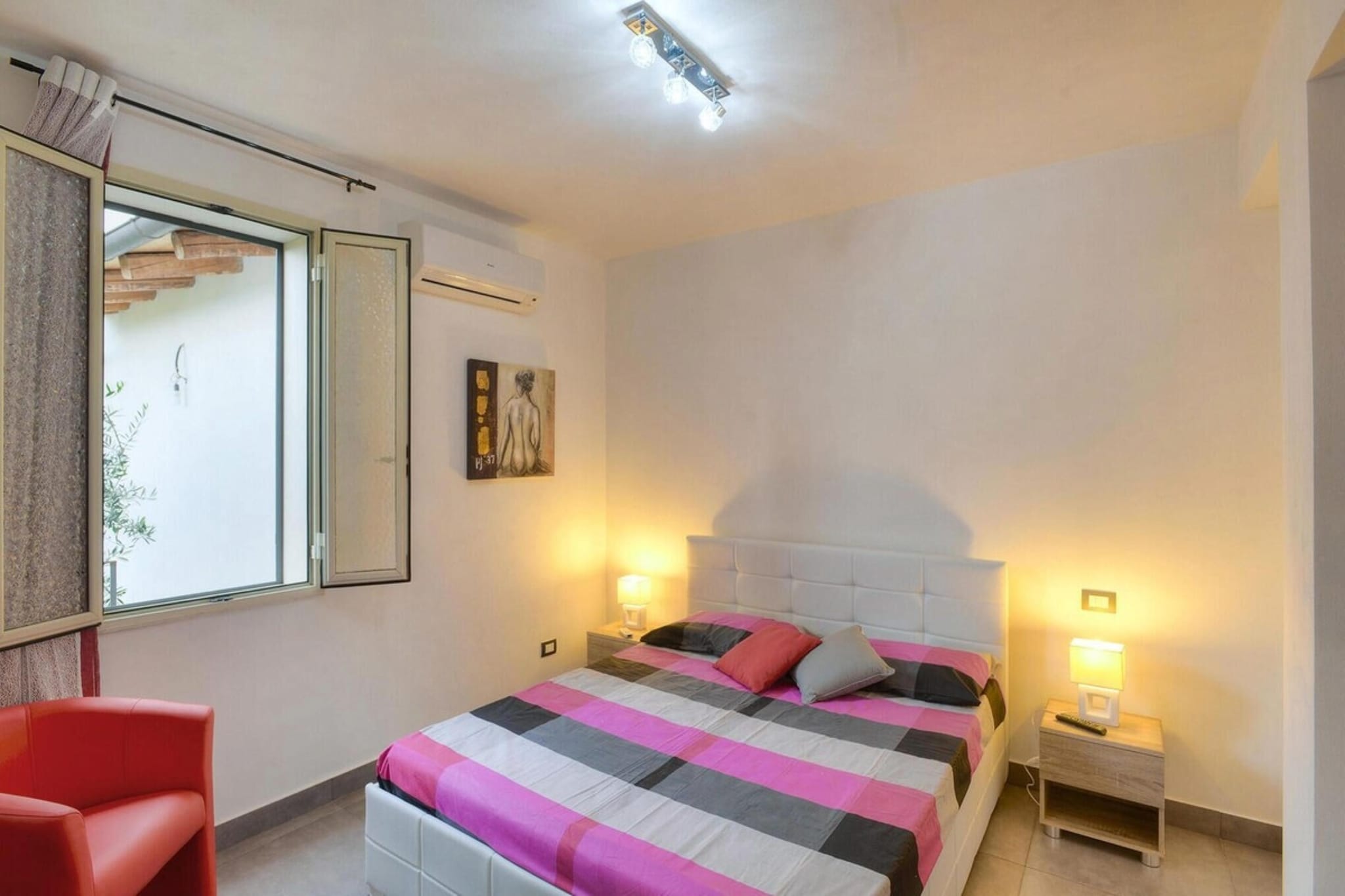 Ground floor: (Living room(TV, fireplace, seating area), Large kitchen(dining table, hob, electric kettle, toaster, coffee machine, oven, microwave, dishwasher, fridge-freezer, washbasin), bedroom(double bed), bedroom(double bed), bathroom(shower, washbasin, toilet, bidet), bathroom(shower, washbasin, toilet, bidet), patio, air conditioning)\n\nOn the 1st floor: (bedroom(double bed), bedroom(double bed), bathroom(shower, washbasin, toilet, bidet), bathroom(shower, washbasin, toilet, bidet), air conditioning)\n\ngarden(private, landscaped garden), garden furniture, sun loungers, BBQ, parking, swimming pool(private, outside, opened from May upto and including Oct), play equipment