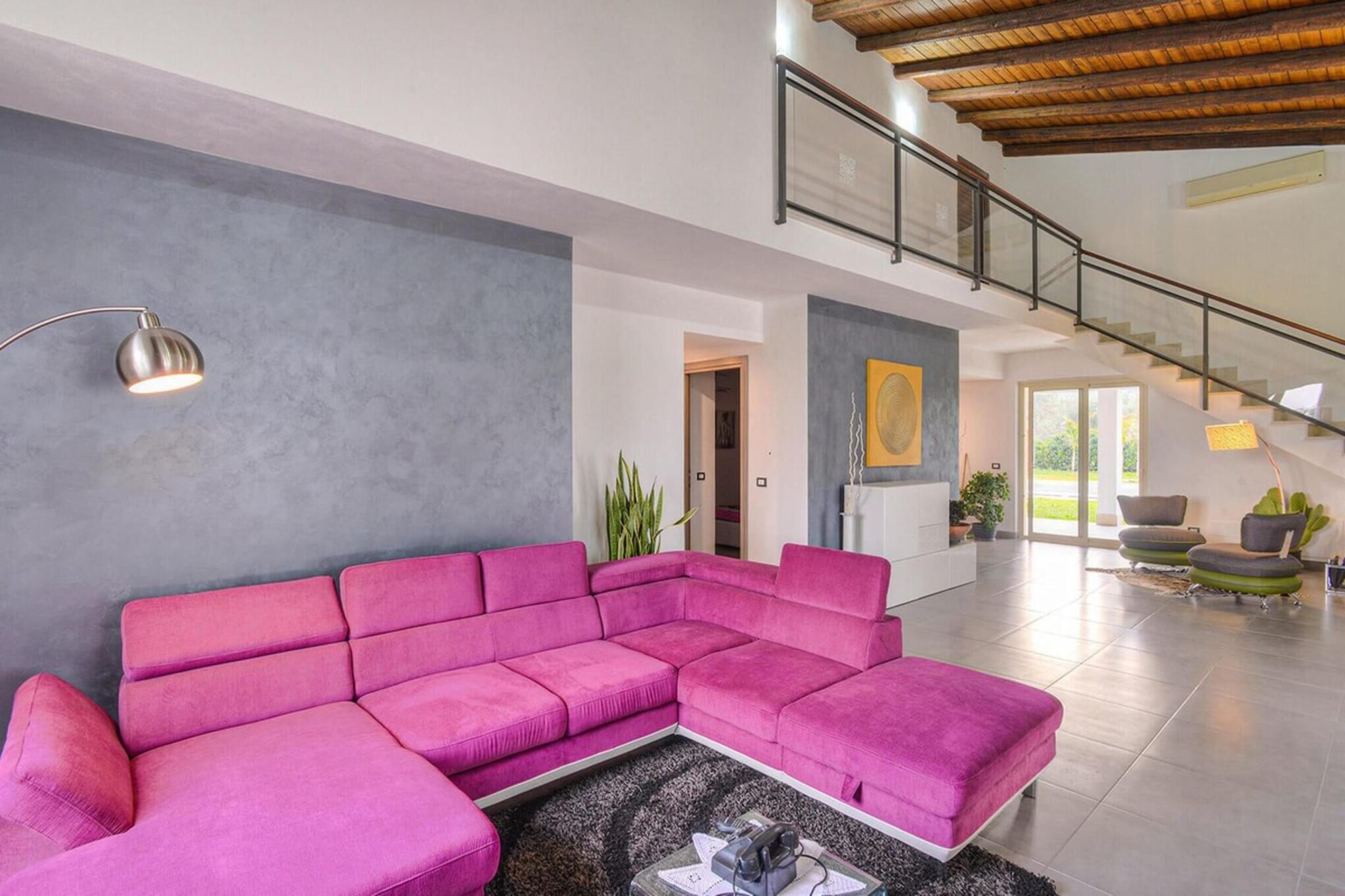 Surrounded by the golden light of southeastern Sicily, this spacious villa offers a warm and welcoming retreat for up to eight guests. Set within a beautifully landscaped private garden, it invites you to slow down, breathe in the Mediterranean air and enjoy the simple pleasure of outdoor living. Mornings begin on the patio with coffee in hand, while warm evenings gather everyone around the barbecue or by the glow of the fireplace inside. With a private pool shimmering under the Sicilian sun, this villa is a haven of comfort and relaxation.

Inside, the atmosphere is bright, airy and designed for shared moments. The large kitchen is fully equipped for cooking together complete with oven, dishwasher, microwave, coffee machine and a generous dining area. The living room, with its fireplace and cosy seating, is perfect for unwinding after a day of exploring. Four comfortable bedrooms two on the ground floor and two on the first floor each paired with a modern bathroom, ensure privacy for all guests. Air conditioning throughout the home keeps every room fresh during warm summer days.

Beyond the villa, the beauty of Siracusa awaits. In a short drive, you can stroll through the ancient streets of Ortigia, explore Greek and Roman ruins at the Neapolis Archaeological Park or relax on sandy beaches with crystal-clear water. Venture further to discover Noto’s Baroque architecture, the nature reserves of Cavagrande and Vendicari, or charming fishing villages along the coast. Whether you spend your days sightseeing or simply lounging by the pool, this villa offers an unforgettable stay in one of Sicily’s most enchanting regions.

