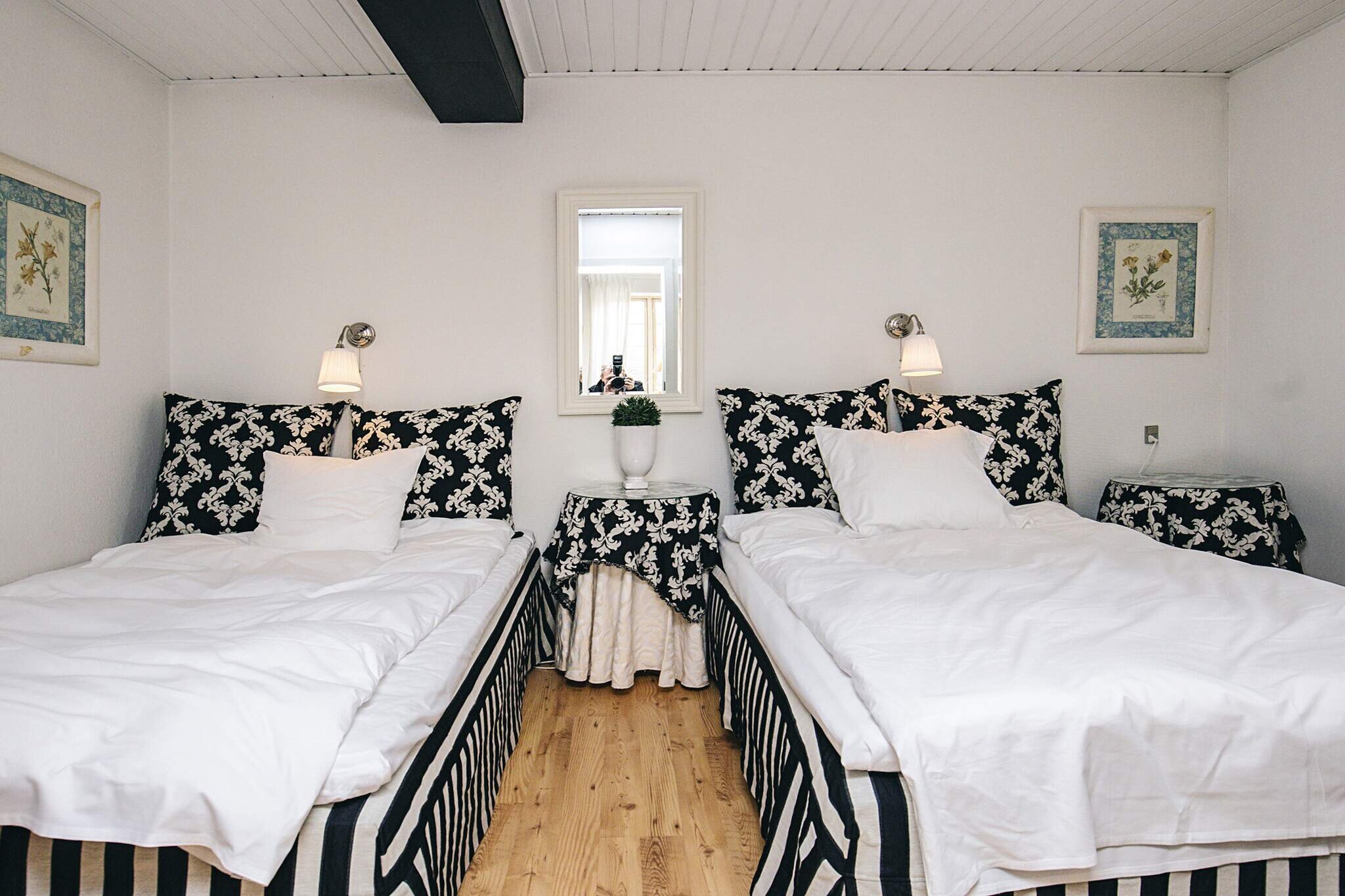 Kitchen(cooker(electric), coffee machine, dishwasher, fridge(+ freezer)), Living/bed room(single folding bed, TV), bedroom(2x double bed), bathroom(washbasin, shower, toilet), washing machine, terrace, garden furniture, swimming pool(indoor)