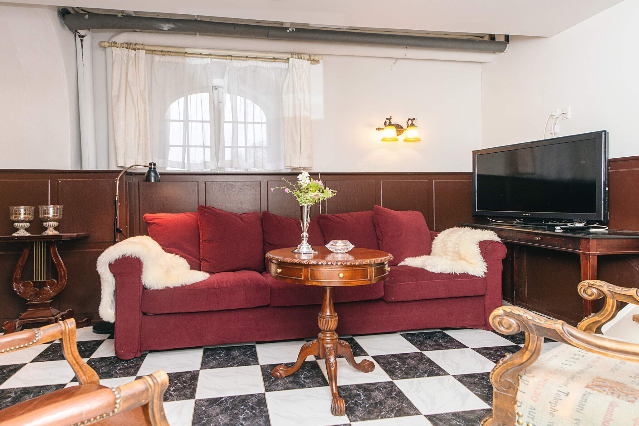 Welcome to this charming eight-person apartment located within the historic Sophiendal Castle, offering a unique blend of classic castle history and contemporary comfort. The apartment is beautifully situated amidst nature, making it perfect for both relaxation and active pursuits. It is an ideal choice for a family holiday, a trip with friends, or a weekend getaway focused on tranquility, nature, and shared cozy moments. The location provides excellent access to outdoor activities, placing guests close to golf courses, forest trails, and hiking routes. Furthermore, the castle's location offers short driving distances to the cities of Skanderborg, Aarhus, and Silkeborg, allowing for easy day trips. For convenience, dining options are available on-site at Sophiendal Castle, providing a simple and delicious solution after a full day of sightseeing or activities. Guests can enjoy a flexible check-in process, utilizing either a key box or checking in physically at the reception desk, which is open from 8 AM to 6 PM (a quick visit to reception is required to provide personal details). Experience the rich castle history, immerse yourself in nature, and create lifelong memories at Sophiendal, all while having a comfortable and centrally located base for exploring the region.A refundable deposit might be charged closer to your check-in date. The security deposit ensures a smooth stay and covers any additional services or consumption charges.This deposit covers utilities consumed during your stay and any additional services that may be taken.The final amount will be adjusted based on actual meter readings, actual usage of extra services, and any remaining balance will be refunded within 21 days after checkout.This deposit simply acts as a prepayment for charges that  you would anyways pay for, ensuring a seamless stay and check-out experience.
