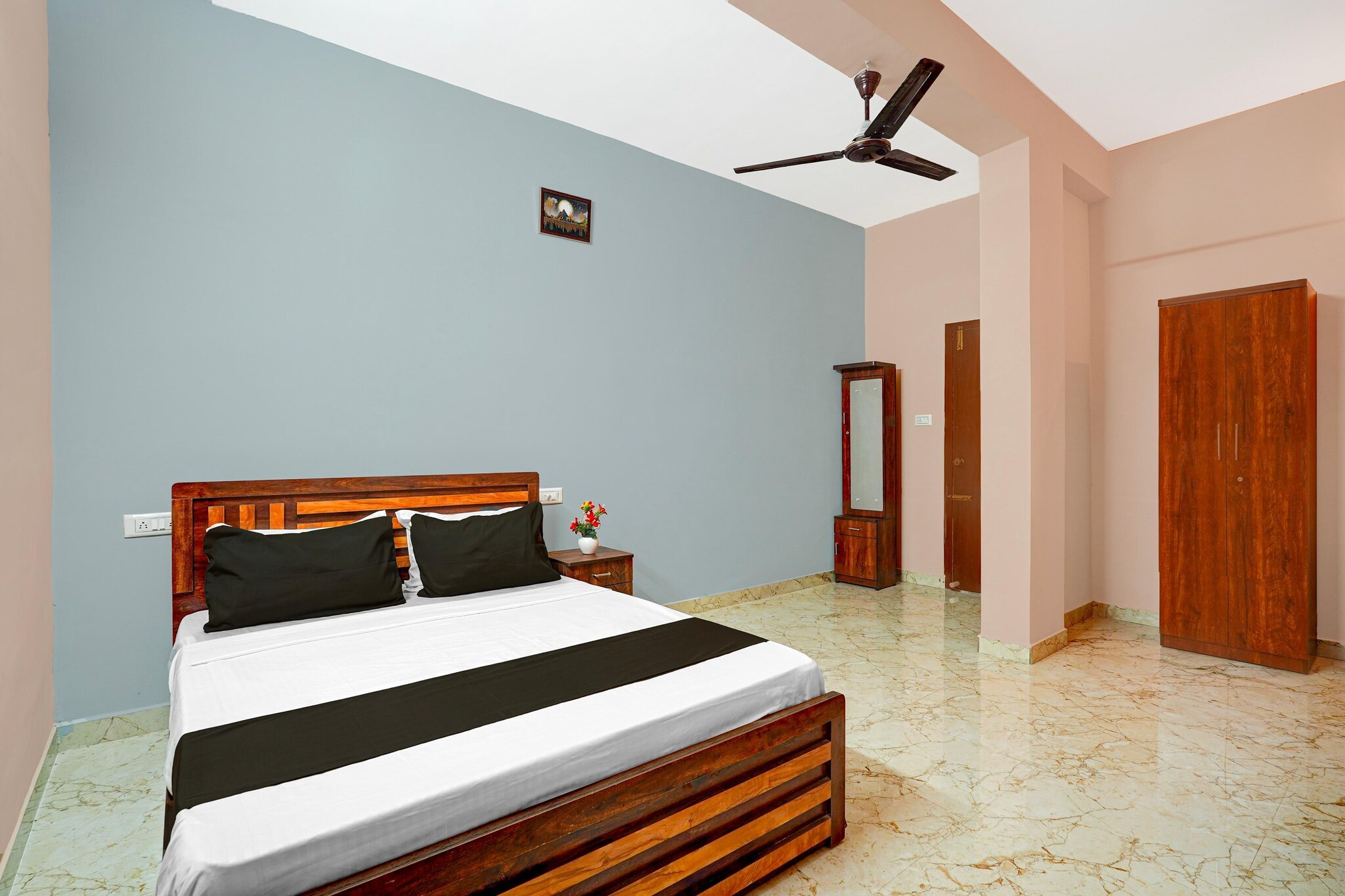 Comfortable Accommodations: Hotel O Gopalan Mall Bangalore Formerly Gm Comforts in Bangalore offers family rooms with air-conditioning, private bathrooms, work desks, and seating areas. Each room includes free WiFi, a TV, and free toiletries.

Convenient Facilities: Guests benefit from a 24-hour front desk, daily housekeeping service, room service, and luggage storage. Additional amenities include a work desk, seating area, tiled floors, and a wardrobe.

Prime Location: Located 40 km from Kempegowda International Airport, the hotel is near attractions such as Bull Temple (3.7 km), Bangalore City Railway Station (3.9 km), and Cubbon Park (7 km).

Unmarried couples are warmly welcome at this property.
Guests with local ID proof are warmly welcome.
Foreign guests are welcome and allowed to stay at this property without any restrictions
Early Check-In Policy: A full day’s room rate will be charged for check-ins before 6:00 AM. Complimentary early check-in is available between 6:00 AM and 10:00 AM, subject to room availability.
 
Check-in is only available to guests aged 18 and above. Please provide a government-issued ID to confirm your age.