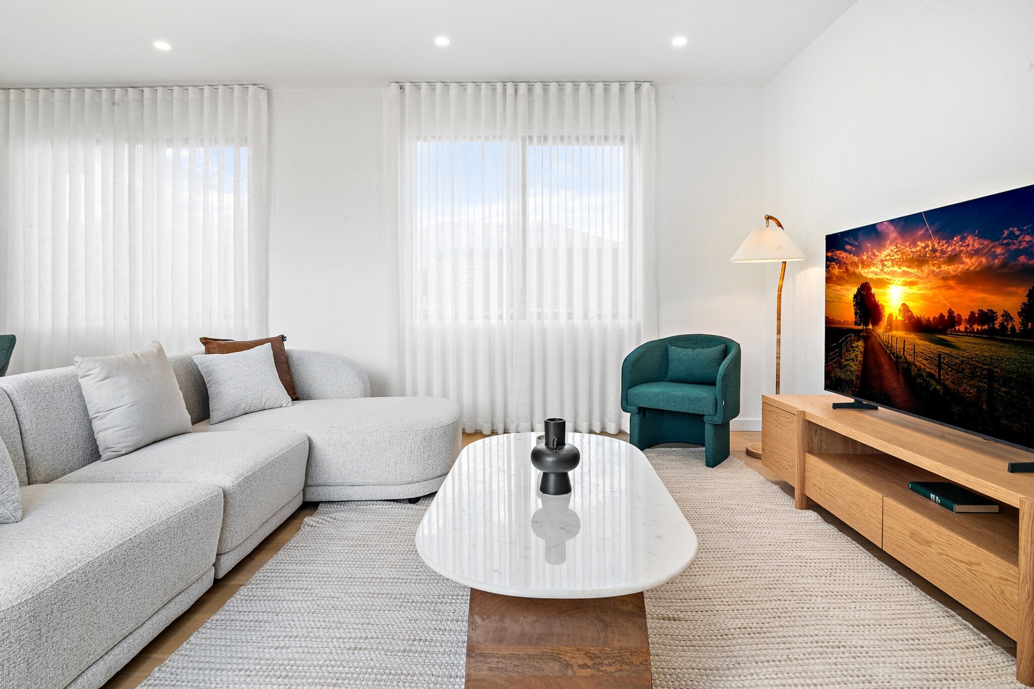Property description
This stylish new townhouse in Pascoe Vale features three comfortable bedrooms, a welcoming living area, and a private garage. With sleek interiors and contemporary furnishings, it’s a perfect base for relaxing or exploring nearby cafés and parks. Enjoy the convenience of seamless self-check-in and a peaceful suburban atmosphere just a short drive from Melbourne’s inner north.
The space
Step inside this thoughtfully designed townhouse and discover a space where comfort meets clean-lined modern style. The living area is beautifully furnished with a three-seater sofa and two armchairs, all arranged around a smart TV and coffee table atop warm wooden flooring. Flowing seamlessly from the lounge, the dining space features a table with seating for six — ideal for shared meals or casual gatherings.
The kitchen is equipped with essential appliances including an oven, gas cooktop, toaster, kettle, dishwasher, coffee machine and microwave , the layout offers a great space for preparing home-style meals.
Upstairs, three bedrooms offer a restful escape — two with queen beds and one with twin singles — all complete with quality bedding and ample wardrobe space. The main bedroom features an ensuite, and there’s a separate family bathroom as well as an additional powder room for convenience.