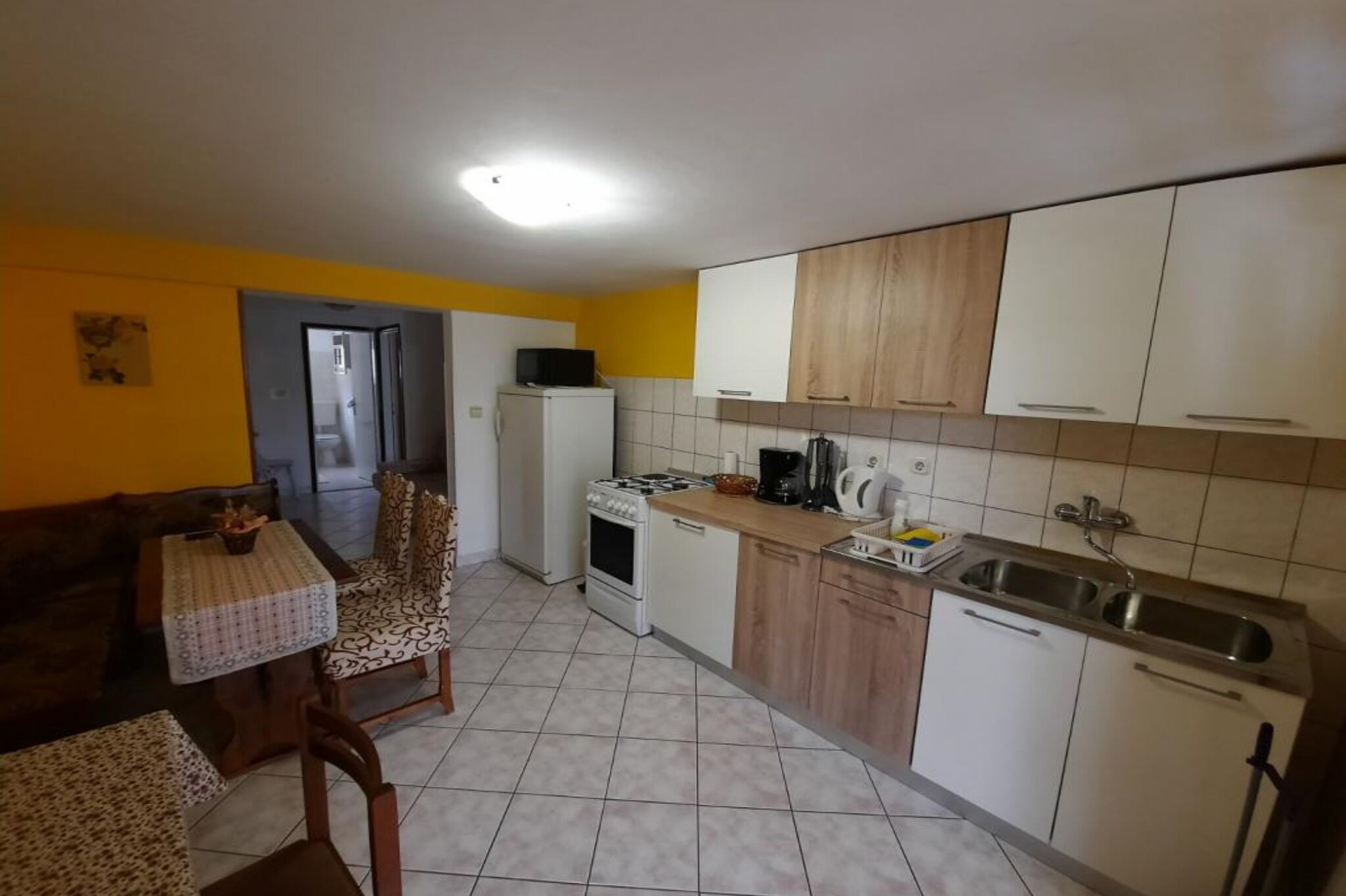Apartments Matušan Kampor Rab are located in Kampor, on the island of Rab, famous for its breathtaking sandy beaches.

Note:
Private parking is available, and a reservation is required.
Wi-Fi is available throughout the property.
Pets are allowed with notice.
Pet fee: 10 EUR per pet per night.

This one-bedroom can accommodate up to three guests. It features an SAT/flat-screen TV. The private bathroom is equipped with a bathtub and toilet.

Thanks to its excellent location, everything you'll need for your vacation is just a short walk away. Grocery stores, cafes, restaurants—everything is within a 300 m radius. The beach is 700 m away from the property.

The airport is 74 km away from the property.