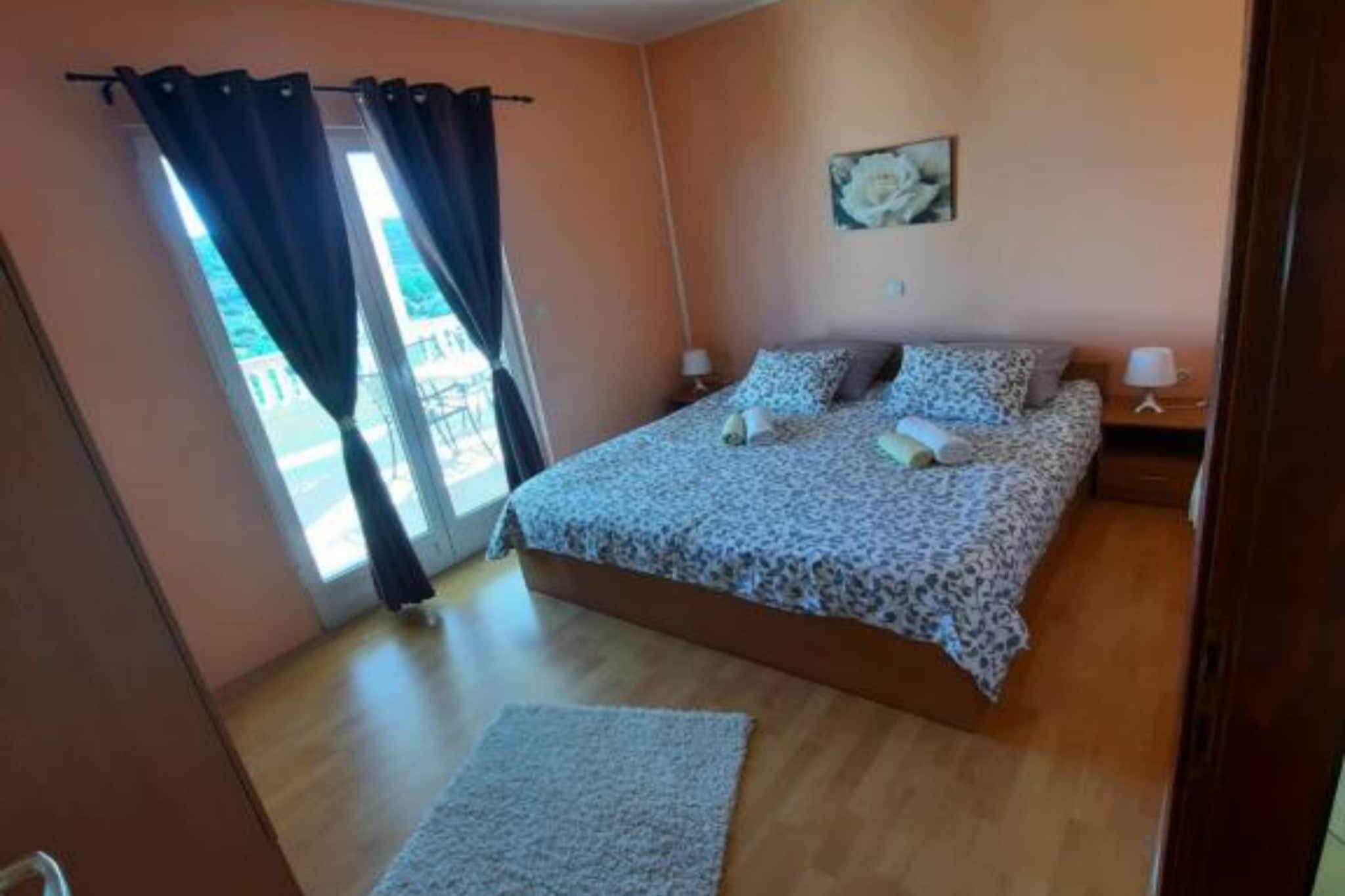 Apartments Matušan Kampor Rab are located in Kampor, on the island of Rab, famous for its breathtaking sandy beaches.

Note:
Private parking is available, and a reservation is required.
Wi-Fi is available throughout the property.
Pets are allowed with notice.
Pet fee: 10 EUR per pet per night.

This two-bedroom can accommodate up to five guests. It features an SAT/flat-screen TV. The private bathroom is equipped with a bathtub and toilet.

Thanks to its excellent location, everything you'll need for your vacation is just a short walk away. Grocery stores, cafes, restaurants—everything is within a 300 m radius. The beach is 700 m away from the property.

The airport is 74 km away from the property.