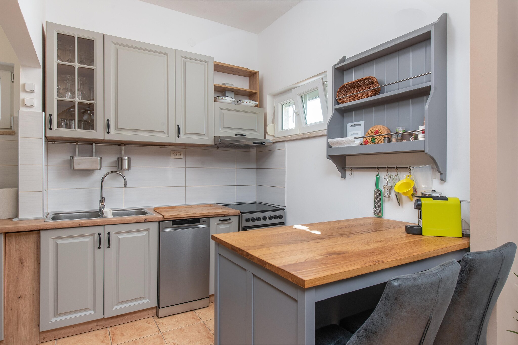open kitchen(electric kettle, toaster, cooker, coffee machine, oven, dishwasher, freezer, Blender, dishes and cutlery(Bowls, chopsticks, plates, cups, etc.), Cooking basics(Pots and pans, oil, salt and pepper), Wine glasses), Living/diningroom(TV, dining table, seating area), bedroom(double bed), bedroom(double bed), bedroom(single bed), bathroom(washbasin, toilet, hairdryer, shampoo, body soap, hot water, Cleaning products, Conditioner), Internet access, dining table, tumble dryer, cot, washing machine, heating, air conditioning, garden furniture, sun loungers, BBQ, high chair, iron, hairdryer, drying cabinet, crib(free), hot water, Essentials, Extra pillows and blankets, Long term stays allowed