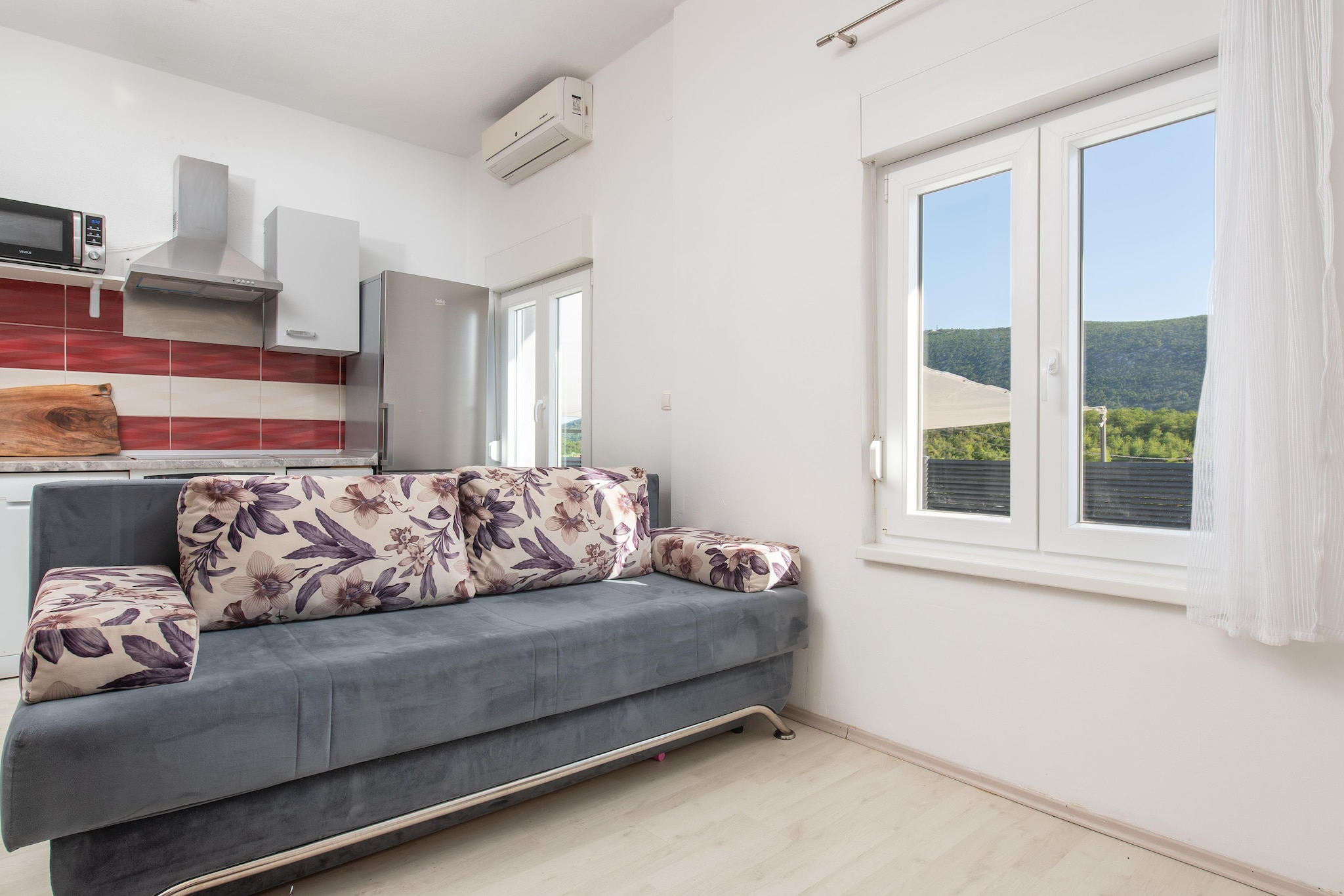 Tucked into the peaceful village of Tugare, just a short drive from the beaches and adventures of the Omiš coast, Villa Kristina is designed for families who want space, privacy, and the freedom to truly relax together. With room for up to 12 guests, this generous 240 m² home sits within a private garden and offers the perfect blend of comfort, play, and calm.

From the moment you arrive, everything is set up for easy family living. With six air-conditioned double bedrooms spread across two floors, everyone has their own quiet retreat after long days at the pool or seaside. Three full bathrooms are located on the ground floor, while the upper floor offers an additional 2 bathrooms for comfort. Multiple lounge spaces include a ground-floor living room with a TV and dining table, as well as an upstairs living area.

Daily life naturally flows through the villa’s multiple dining and kitchen spaces. With three kitchens, including an outdoor summer kitchen, family meals become effortless - morning breakfasts inside, lunch by the pool, and relaxed evening barbecues under open skies.

Outside, the villa truly becomes a family playground. The heated private pool is the heart of the garden, surrounded by loungers for parents and plenty of space for kids to splash safely. A trampoline and table tennis keep energy levels high, while shaded seating areas invite slower moments with a book or coffee.

With Wi-Fi, a gaming console, and secure private parking, every detail supports a smooth, stress-free stay. And when adventure calls, beaches, rafting, island trips, and family-friendly excursions are all within easy reach.
Villa Kristina is not just where your family stays - it’s where your best holiday memories begin.