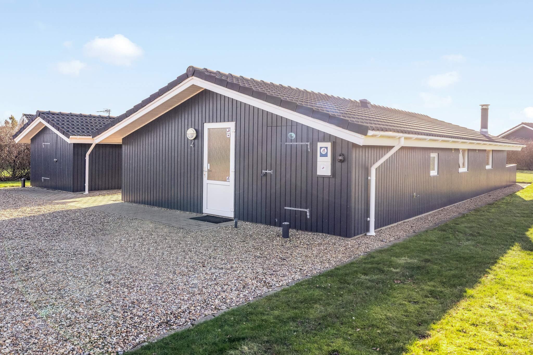 A truly lovely holiday home with a well-designed floor plan where the entire house is perfectly utilised. The house is well equipped and furnished in a relaxed style. After a long day spent in nature, there are plenty of opportunities to unwind – in front of the wood-burning stove, in the sauna, or in front of the TV, which offers both Danish and German channels. The house is located approximately 1,000 metres from Ringkøbing Fjord. This area around Ringkøbing Fjord is becoming increasingly popular among holiday guests. In Bork Havn, you will find the charming marina, which is visited by both locals and tourists arriving by boat. Ringkøbing Fjord is also a true windsurfers’ paradise, thanks to the excellent wind and current conditions. There are bathing opportunities all along the fjord. The beaches here are not as wide as those along the West Coast, and as the water is often shallow with limited current close to the shore, it is an ideal swimming area for children. The entire area offers a wide range of activities and attractions, including angling, sailing and golf.A refundable deposit might be charged closer to your check-in date. The security deposit ensures a smooth stay and covers any additional services or consumption charges.This deposit covers utilities consumed during your stay and any additional services that may be taken.The final amount will be adjusted based on actual meter readings, actual usage of extra services, and any remaining balance will be refunded within 21 days after checkout.This deposit simply acts as a prepayment for charges that  you would anyways pay for, ensuring a seamless stay and check-out experience.