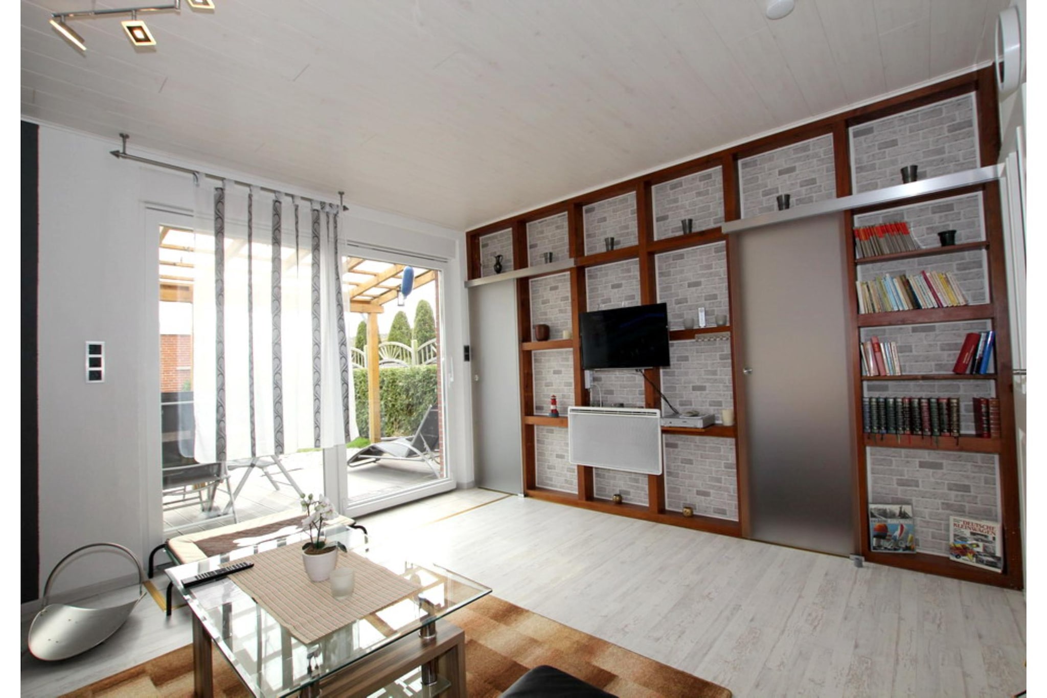 Ferienhaus Strandperle-Woonkamer