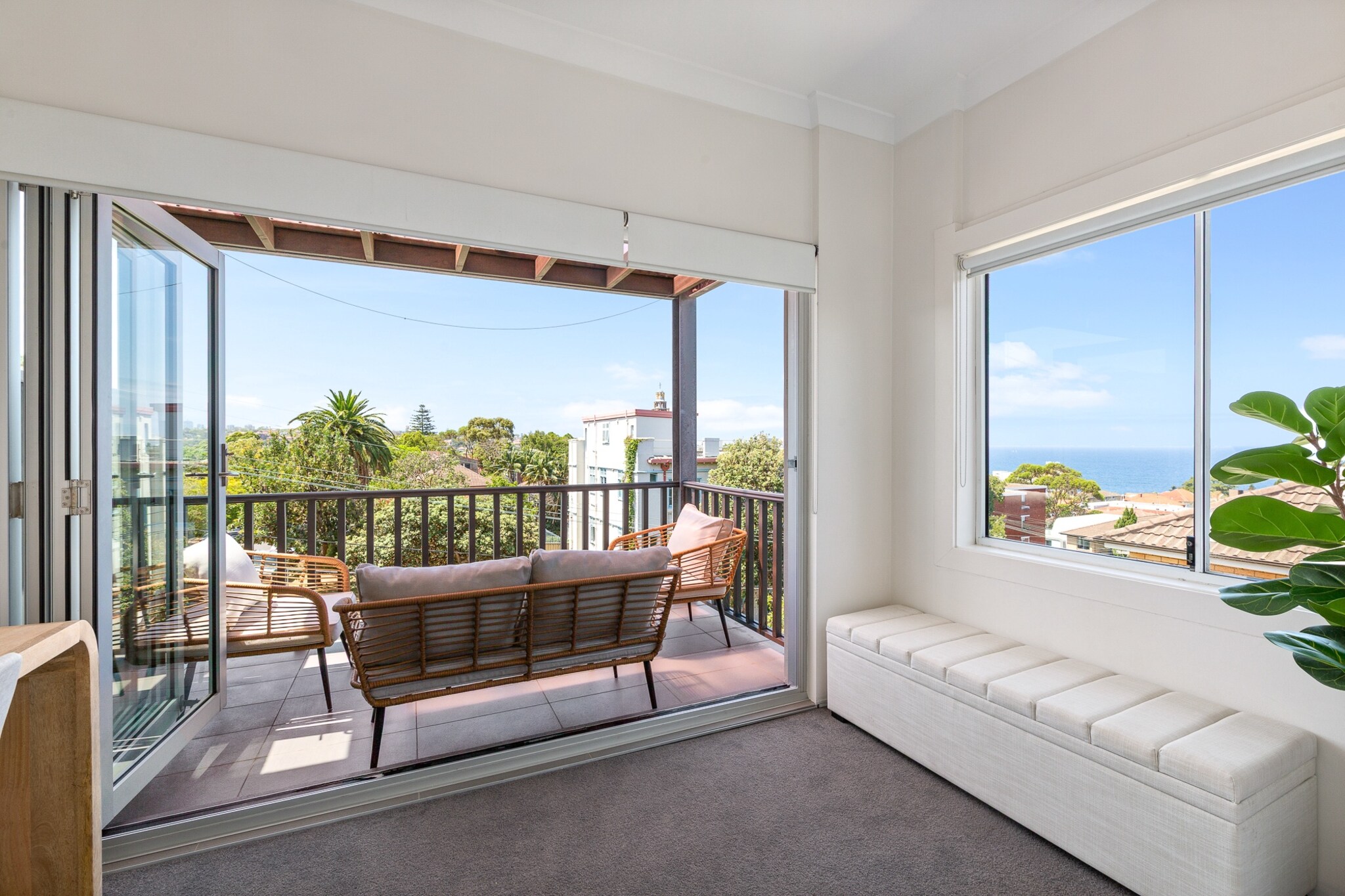Property description
This spacious 2-bedroom apartment in Coogee offers a comfortable stay with a private balcony and scenic views. Featuring a fully equipped kitchen, air conditioning, and a cozy living area, this apartment is perfect for both short-term and long-term stays. Located just minutes from the beach, shops, and public transport, it’s an ideal choice for those seeking relaxation by the coast while being close to all that Coogee has to offer.
The space
This bright apartment boasts a modern, open-plan living area with wooden floors and plenty of natural light. The comfortable lounge area features a sofa, coffee table, and a flat-screen TV with access to Free-to-Air channels, Netflix, and streaming services. Guests can enjoy meals at the dining table, which seats four.
 
The fully equipped kitchen includes an induction stove, electric oven, microwave, dishwasher, and coffee machine, providing all the tools needed to cook at home.
 
The two bedrooms feature queen-sized beds, bedside tables, lamps, and blackout blinds for a restful sleep. The master bedroom also has access to the private balcony, which is perfect for enjoying the outdoors.
 
The bathroom includes a walk-in shower, hairdryer, and toiletries for convenience. A small bathroom bin and toilet brush are also provided.
 
With a private entrance, ceiling fans, and a set of portable fans, the apartment is designed for comfort. It’s a perfect space for couples, families, or business travelers.