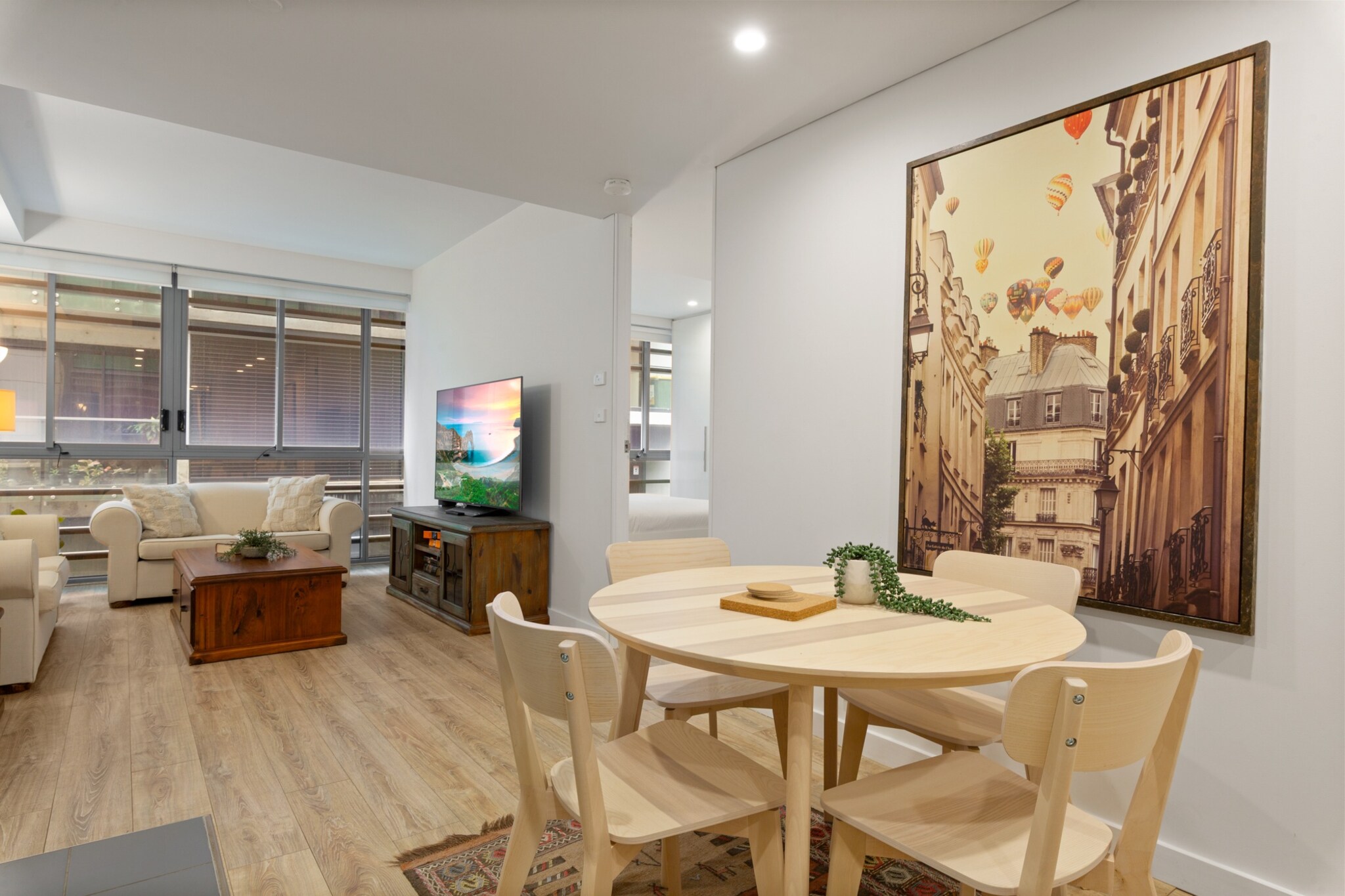 Property description
Situated in Sydney’s buzzing CBD, this 1-bedroom apartment offers a stylish and spacious retreat. Unwind in a bright, open-plan living space, and enjoy the flexibility of a fully equipped kitchen with gas cooktop, dishwasher and coffee machine — ideal for longer stays or business trips. This apartment is particularly well suited to business travellers and remote workers, with a dedicated study nook, fast Wi-Fi and easy access to public transport.
The space
Step into a bright and modern apartment nestled in the heart of Sydney’s CBD. The open living area is furnished with a generous sofa and a large flat-screen TV, ideal for unwinding after a day in the city. Timber floors, neutral tones, and soft lighting create a warm and calming atmosphere throughout.
 
The bedroom features a plush king-sized bed, complete with bedside tables, lamps, and blackout blinds for a peaceful night’s rest. Adjacent is a dedicated study nook, perfect for guests who need to work remotely. The sleek bathroom offers all the essentials, including a hairdryer and modern finishes.
 
Cook with ease in the fully equipped kitchen, boasting a gas stovetop, oven, microwave, and capsule coffee machine. A dining table seats four, ideal for shared meals or planning your next adventure.
 
Laundry facilities are conveniently tucked into the bathroom, with a washer, dryer, and cleaning supplies provided. The apartment also features ducted air conditioning throughout, ensuring year-round comfort. With tasteful furnishings and everything you need for a short or extended stay, this property is an ideal base for exploring Sydney.