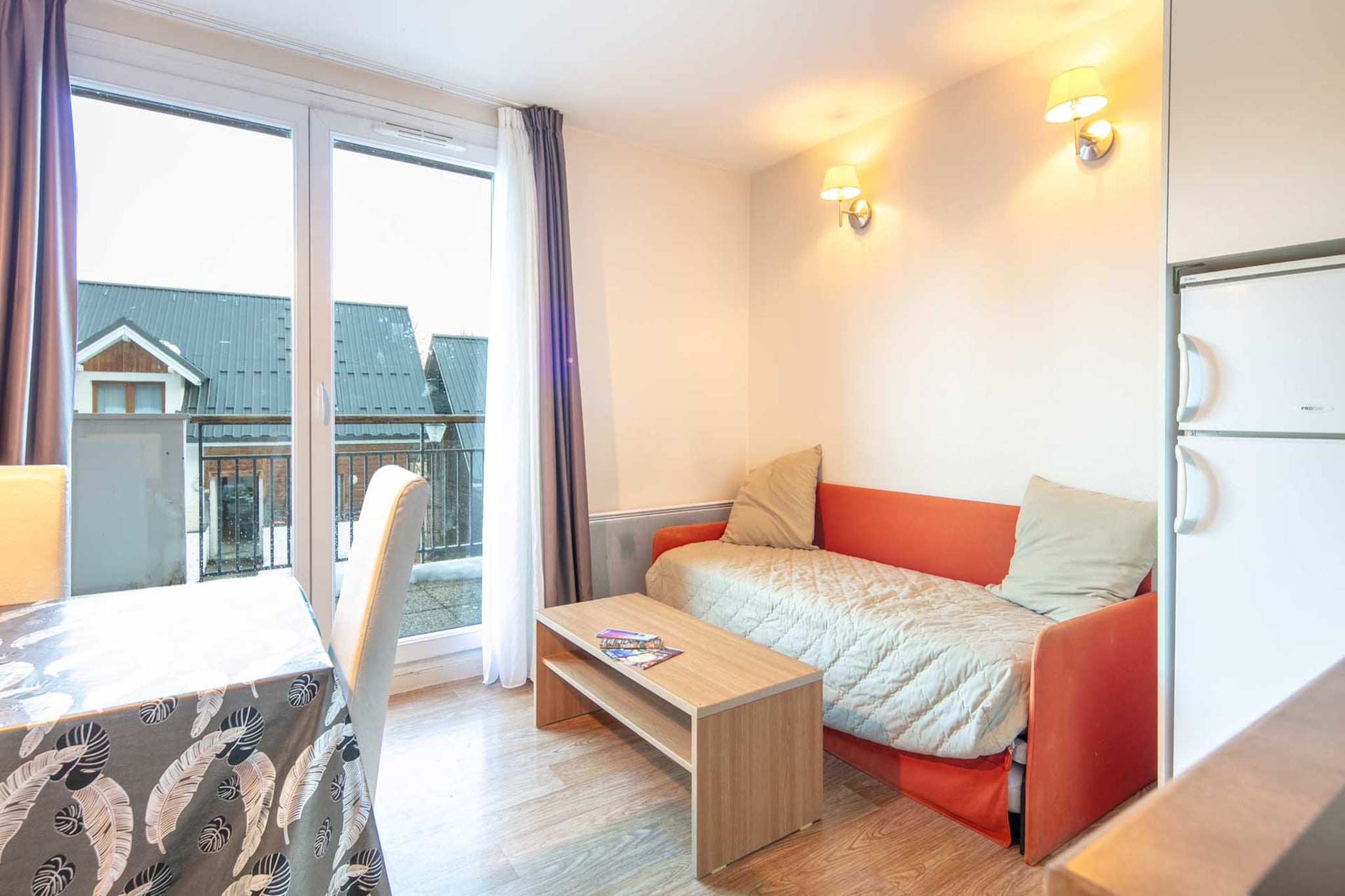 Nestled in the breathtaking landscape of Les Déserts, this 40 m² mountain apartment offers a light-filled and cozy sanctuary for up to six guests. Designed with a thoughtful layout, the home features a restful bedroom with two single beds, a charming sleeping cabin with bunk beds, and a comfortable double sofa bed in the living area. The interior feels bright and airy, opening up to a private balcony where you can breathe in the crisp mountain air and enjoy the peaceful surroundings of this high-altitude retreat.

Your mornings begin in the modern open-plan kitchen, where a fresh pot of coffee and the convenience of a dishwasher make breakfast a breeze. After a day of adventure, you have the ultimate luxury waiting for you: access to a heated communal swimming pool and an indoor hot tub, perfect for soothing tired muscles while the snow falls outside or the summer sun sets over the peaks. With high-speed Wi-Fi and a fully equipped living space, it’s a home that invites you to relax as much as it invites you to explore.

The location is truly privileged, situated in a charming mountainous zone where everything is within reach. You are just 400 meters from the ski resort, allowing you to hit the slopes with ease, and only a short stroll from the local supermarket and the heart of the city. Whether you are enjoying a meal on the balcony with the provided outdoor furniture or cozying up inside with the electric heating, this apartment offers a perfect blend of alpine charm and modern indulgence.