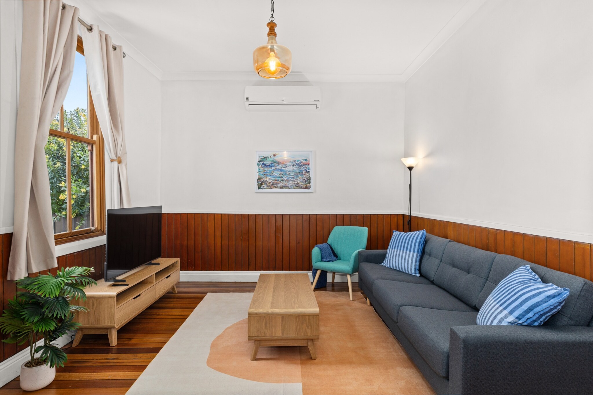 Property description
This spacious 2-bedroom home in Mayfield is perfect for families or small groups. With a private garden, street parking, and comfortable living areas, it provides everything you need for a relaxing stay. Enjoy seamless self-check-in via a lockbox, and the property offers easy access to local parks, cafés, and public transport. A peaceful home with all the modern comforts, perfect for both short and long stays
The space
Step into this light-filled, spacious home featuring an open-plan living area with a comfortable sofa, coffee table, and a TV with free-to-air channels. Large windows allow plenty of natural light into the living space, creating a warm and welcoming atmosphere. The dining area, adjacent to the kitchen, seats four and offers a great spot for enjoying meals together.
 
The kitchen is well-equipped with an electric stove, oven, microwave, and fridge, making it easy to prepare your favourite meals. The property includes two well-sized bedrooms, one with a King bed, the other with two King Singles, bedside tables, and ample storage space. The master bedroom includes an bathroom.
 
Outside, enjoy the private garden, perfect for outdoor relaxation. The property also features street parking for one vehicle. With air conditioning throughout and fans in every room, you’ll be comfortable year-round.