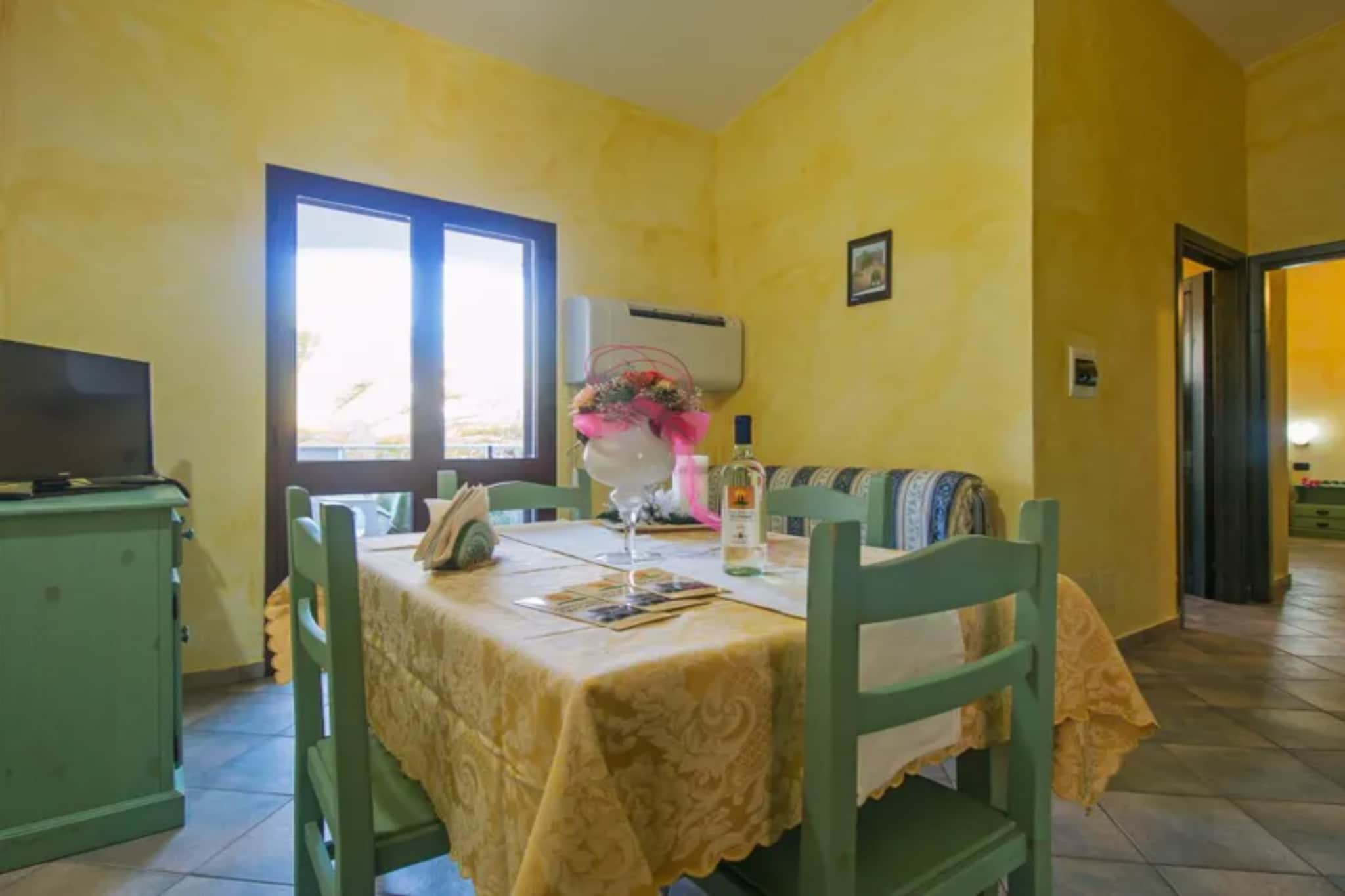 Residence Club Gli Ontani APARTMENT 2 BEDROOMS - 6 PAX - TYPE A R6A-Eetkamer