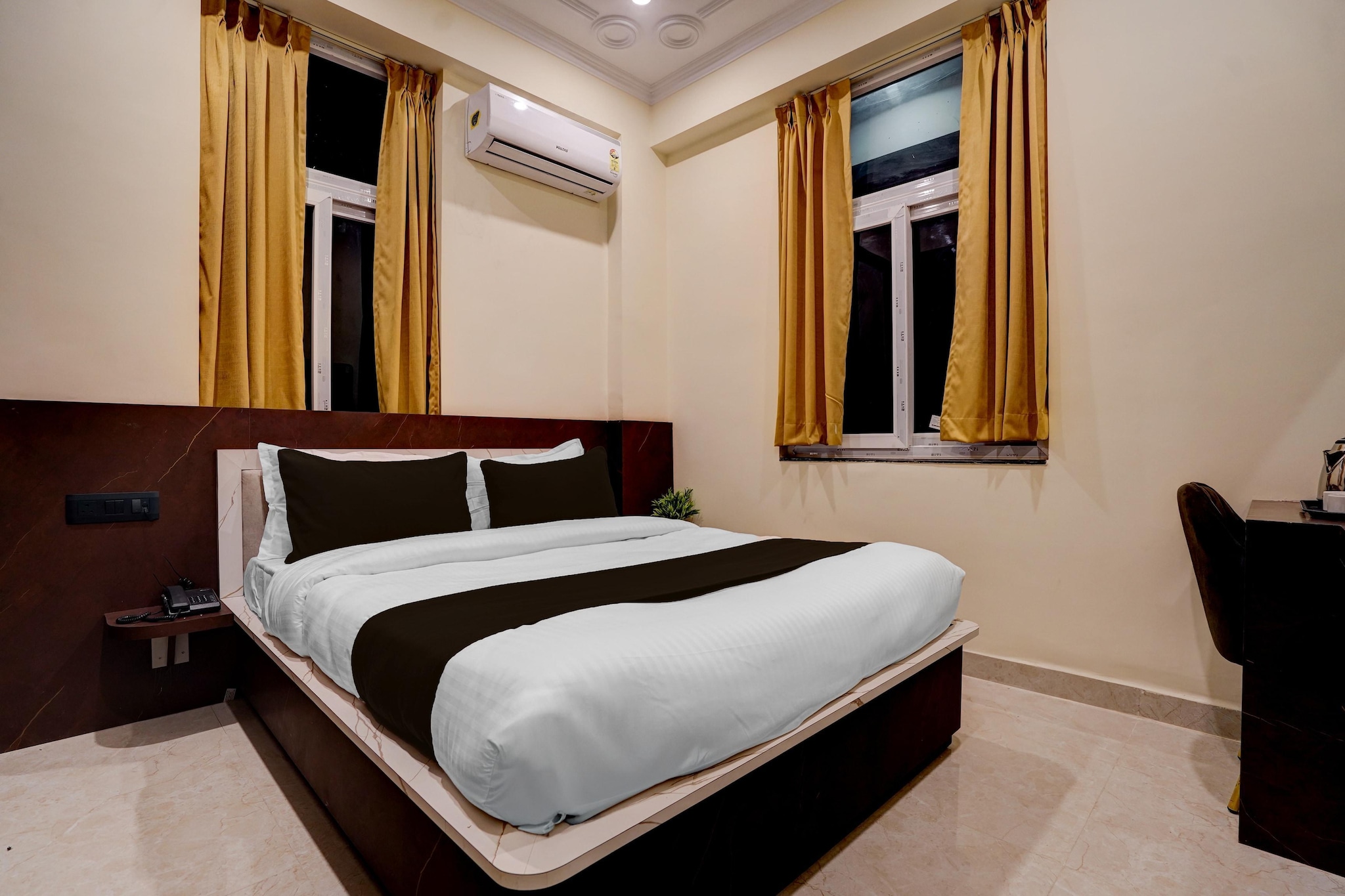 Enjoy a comfortable and hassle-free experience at our thoughtfully designed property. Each room is equipped with modern amenities, cozy bedding, and elegant decor to make you feel right at home. Located conveniently with easy access to public transport and major attractions, it's perfect for both business and leisure travelers. Cleanliness and guest comfort are our top priorities, and our team is available 24/7 to assist you throughout your stay.
 
Unmarried couples are warmly welcome at this property.
Guests with local ID proof are warmly welcome.
Foreign guests are welcome and allowed to stay at this property without any restrictions
Early Check-In Policy: A full day’s room rate will be charged for check-ins before 6:00 AM. Complimentary early check-in is available between 6:00 AM and 10:00 AM, subject to room availability.
 
Check-in is only available to guests aged 18 and above. Please provide a government-issued ID to confirm your age.