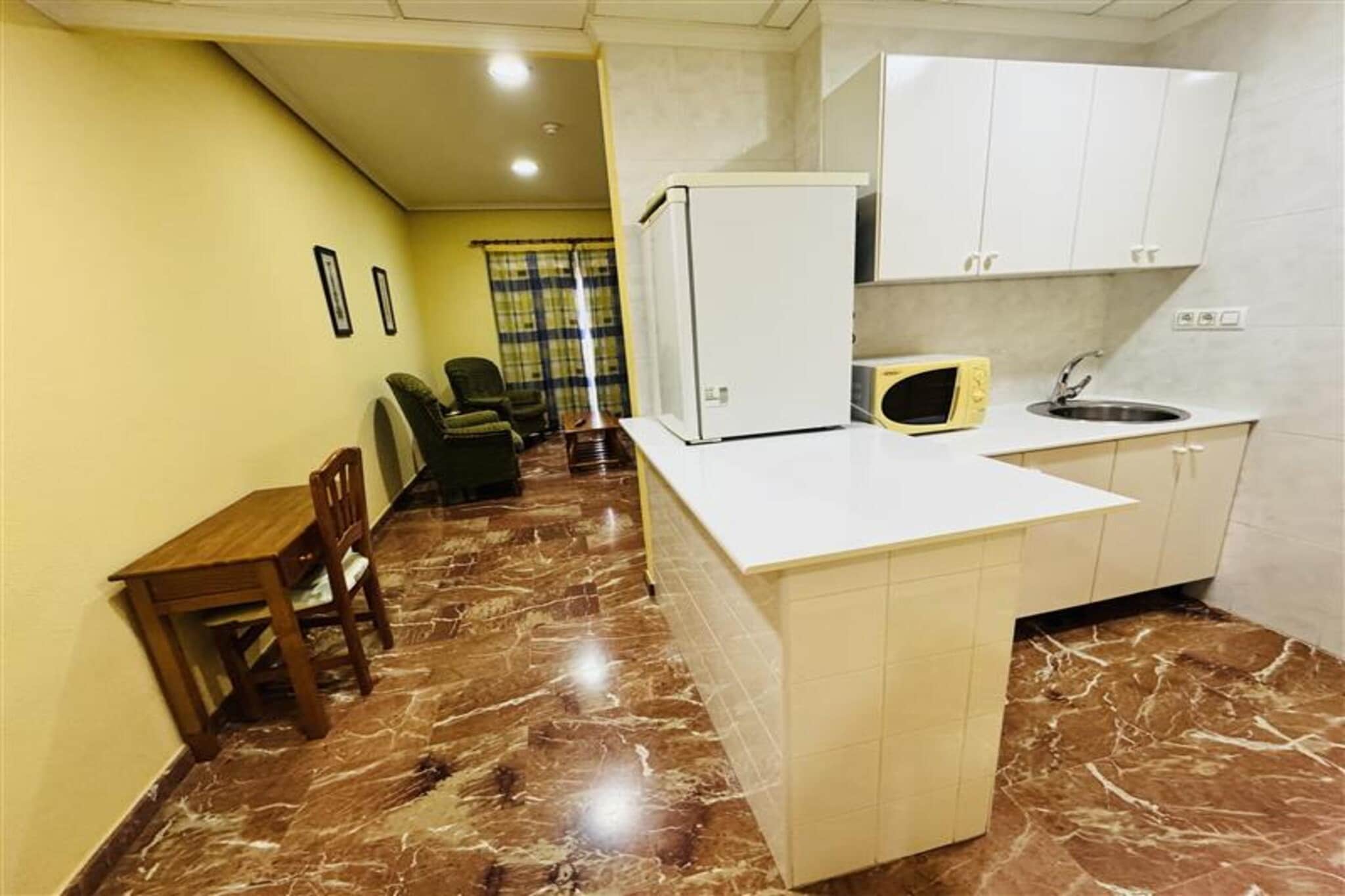Kitchenette(microwave, fridge, dishes and cutlery), Living/diningroom(TV, dining table, seating area), bedroom(double bed), bathroom(bathtub or shower, washbasin, toilet, bidet, hairdryer, shampoo, body soap, Essentials), Internet access, heating, air conditioning, fitness equipment, lift, ironing board, iron