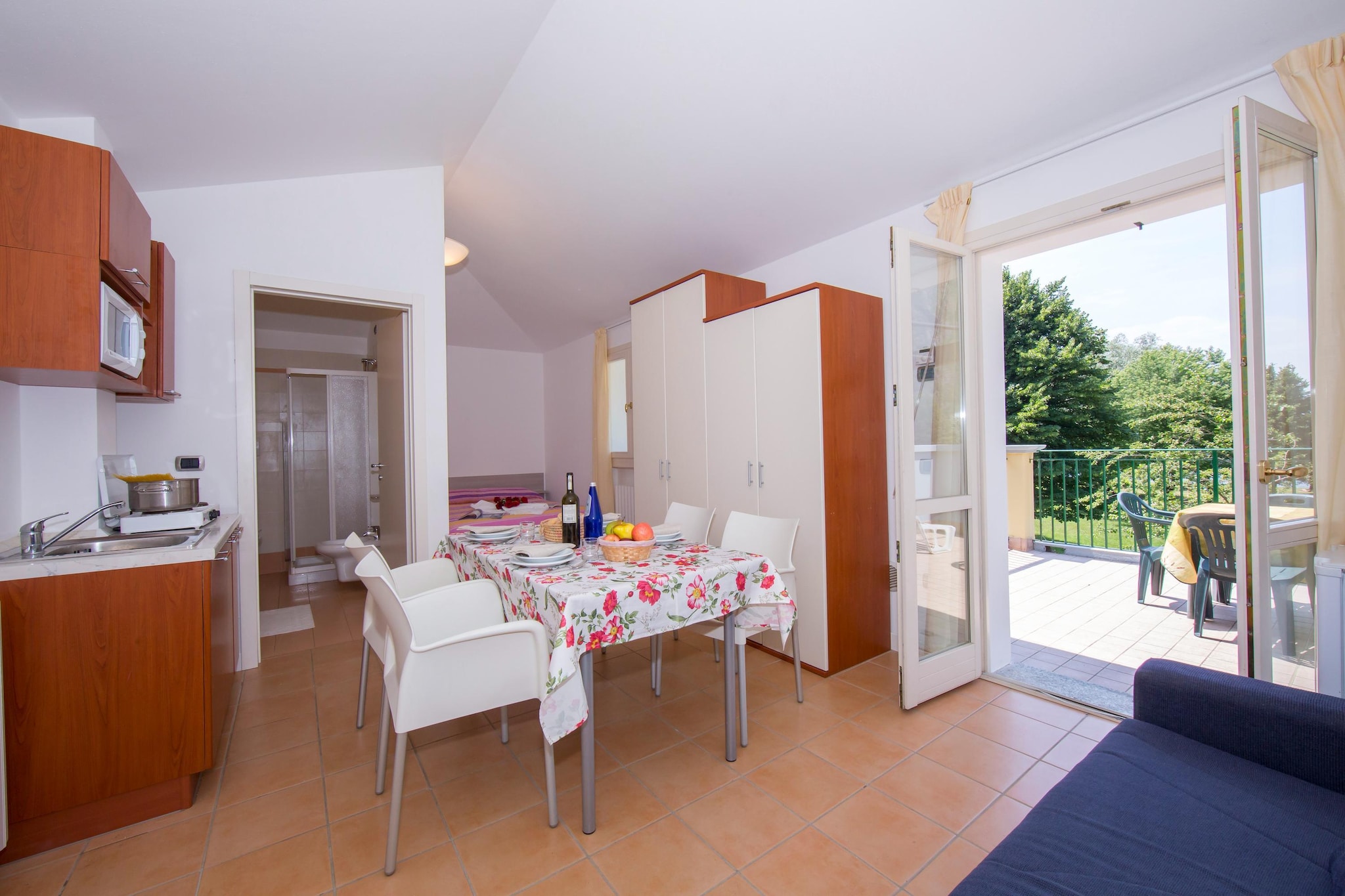 RESIDENCE PORTO LETIZIA - VILLAS-STUDIO 4 PAX VISTA LAGO PLUS 8213 - VSLP4-Eetkamer