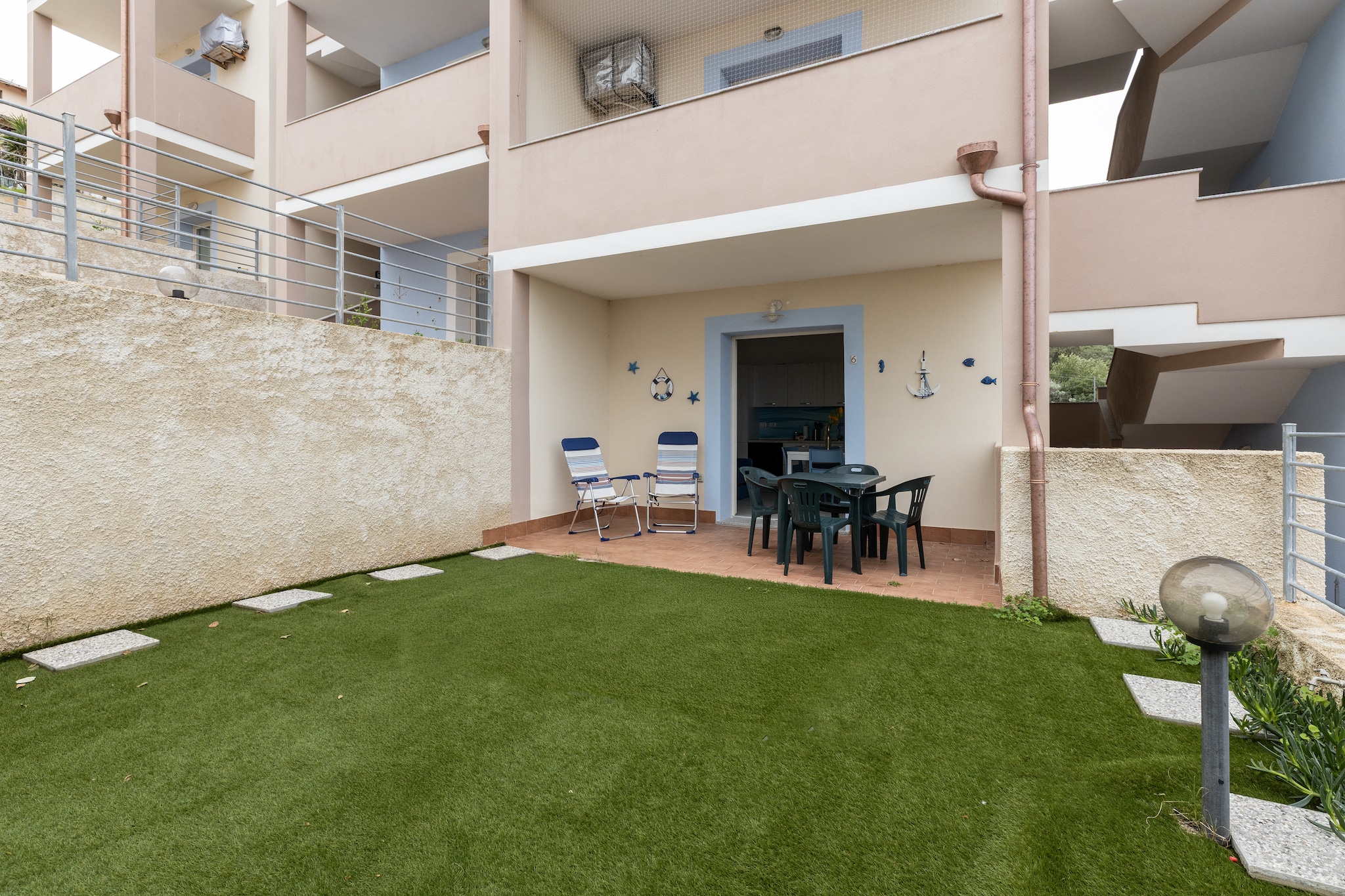 BILO BADESI CON PISCINA-Exterior in summer