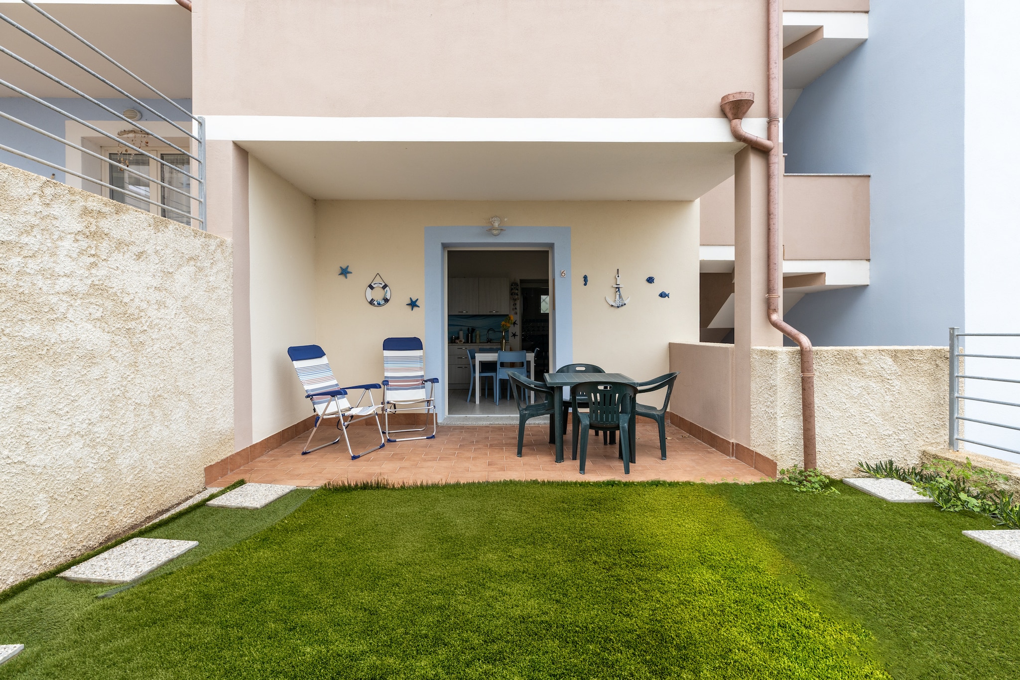 BILO BADESI CON PISCINA-Exterior in summer