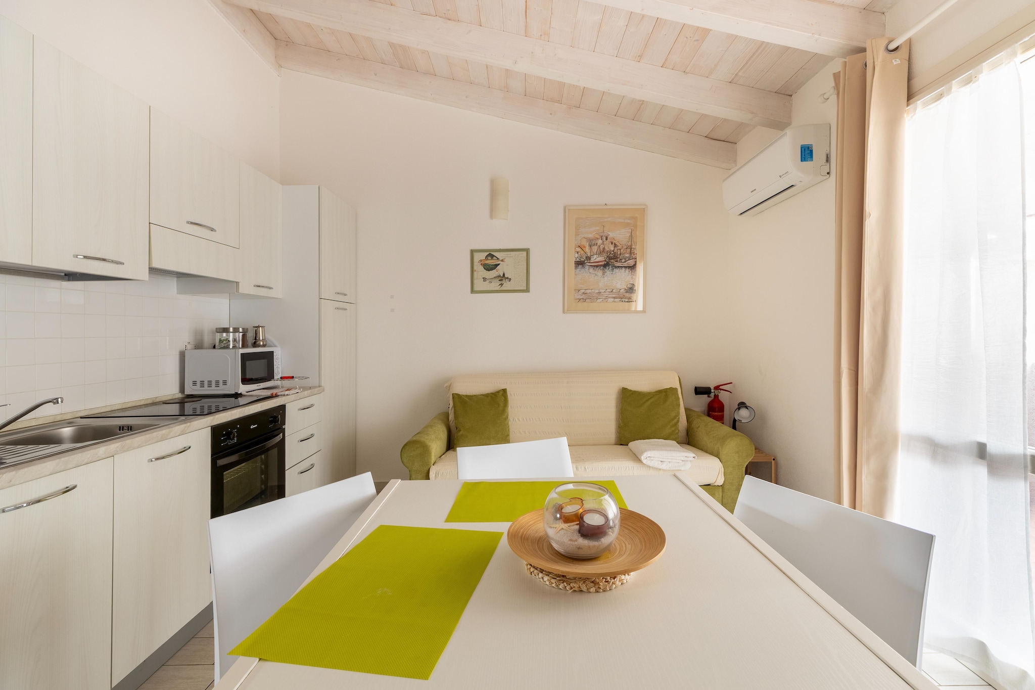 ATTICO BADESI CON PISCINA-Dining room