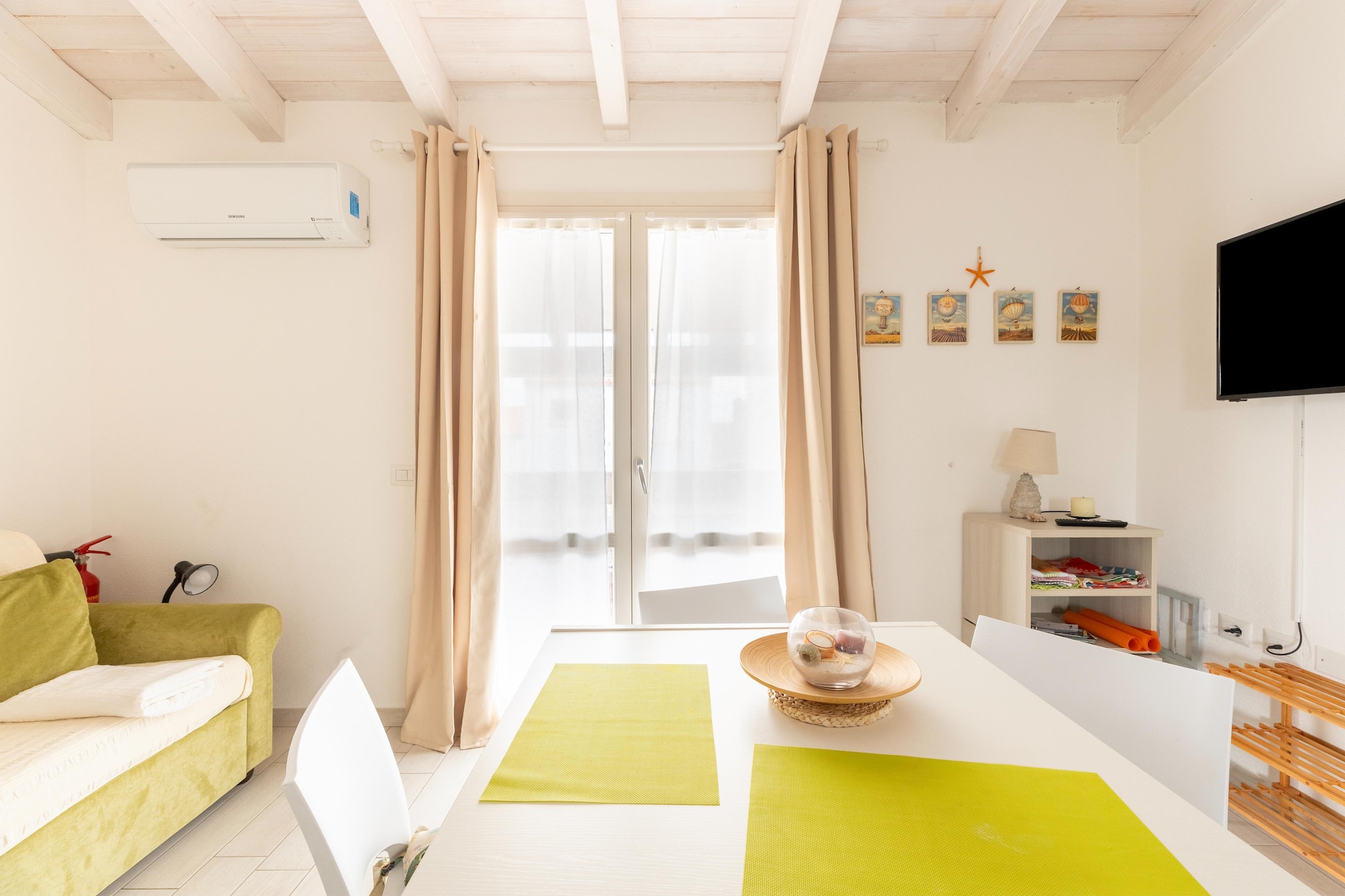 ATTICO BADESI CON PISCINA-Living room