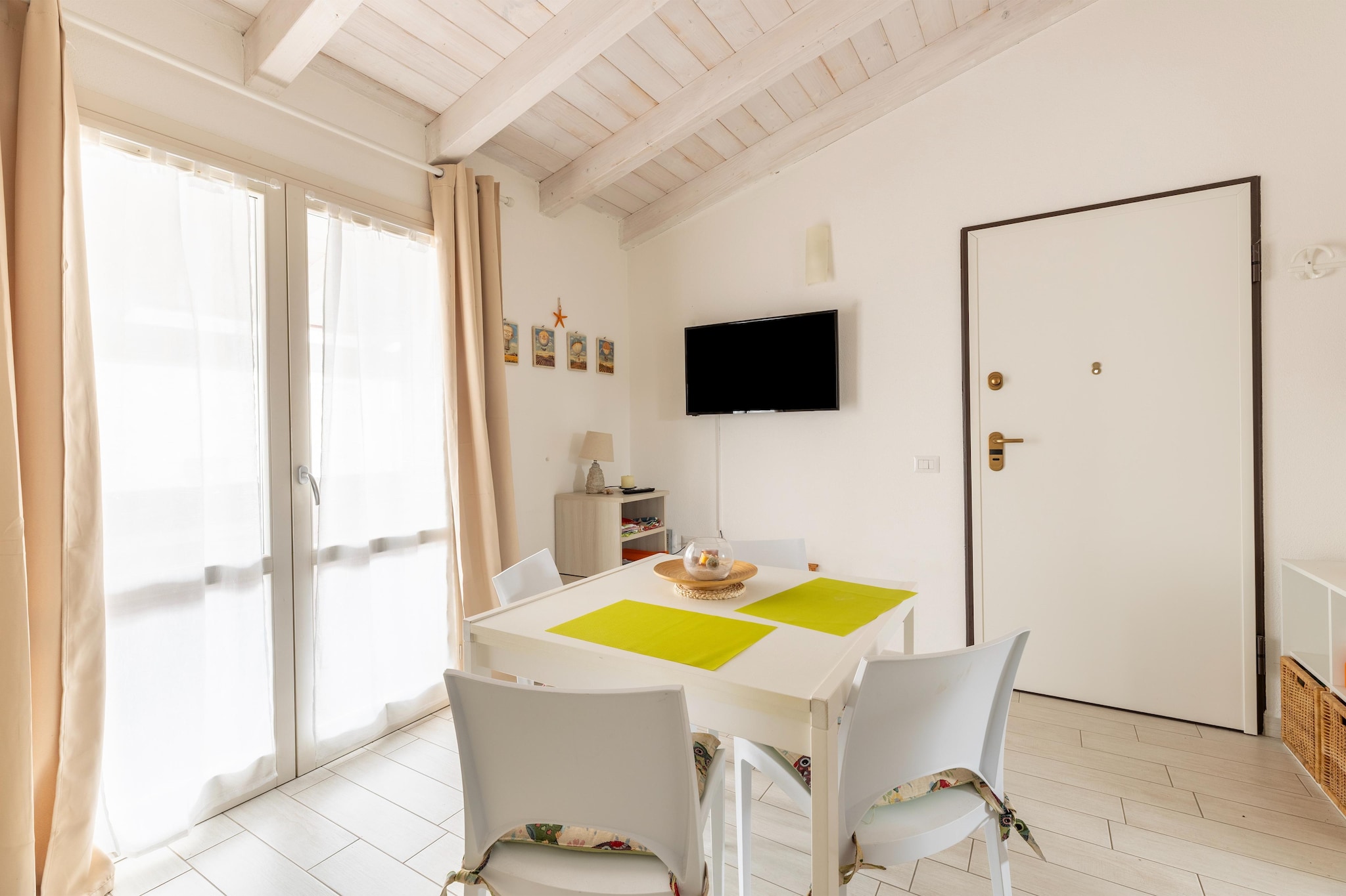 ATTICO BADESI CON PISCINA-Dining room