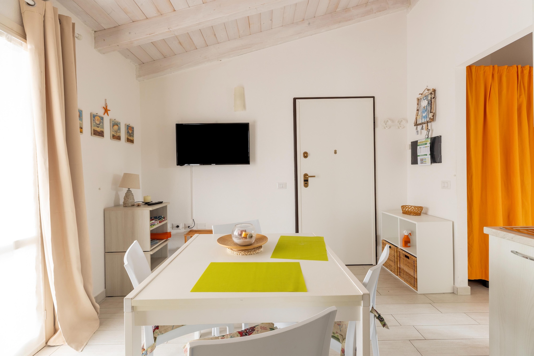 ATTICO BADESI CON PISCINA-Dining room