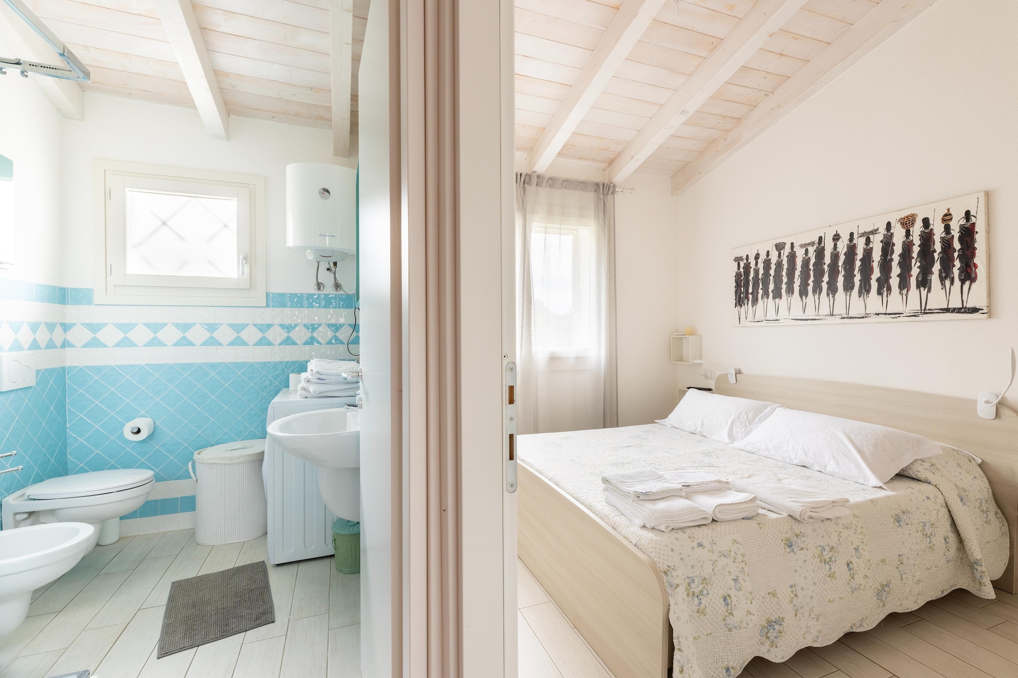 ATTICO BADESI CON PISCINA-Bedroom