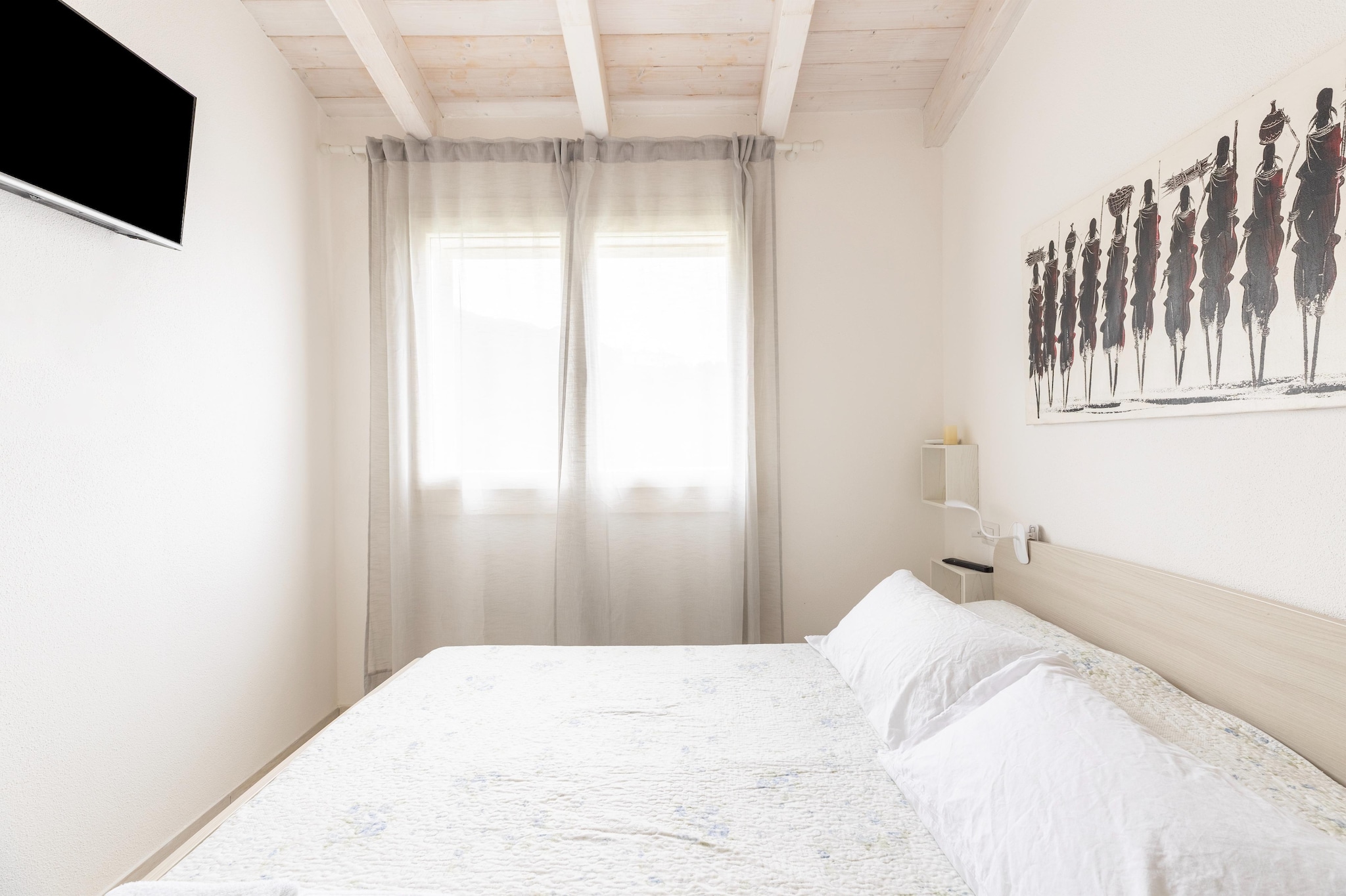 ATTICO BADESI CON PISCINA-Bedroom