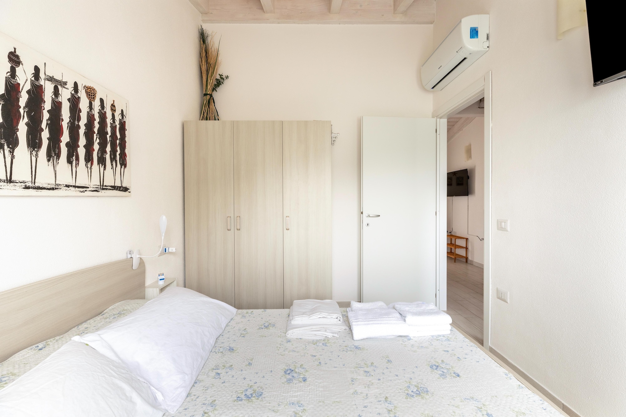 ATTICO BADESI CON PISCINA-Bedroom