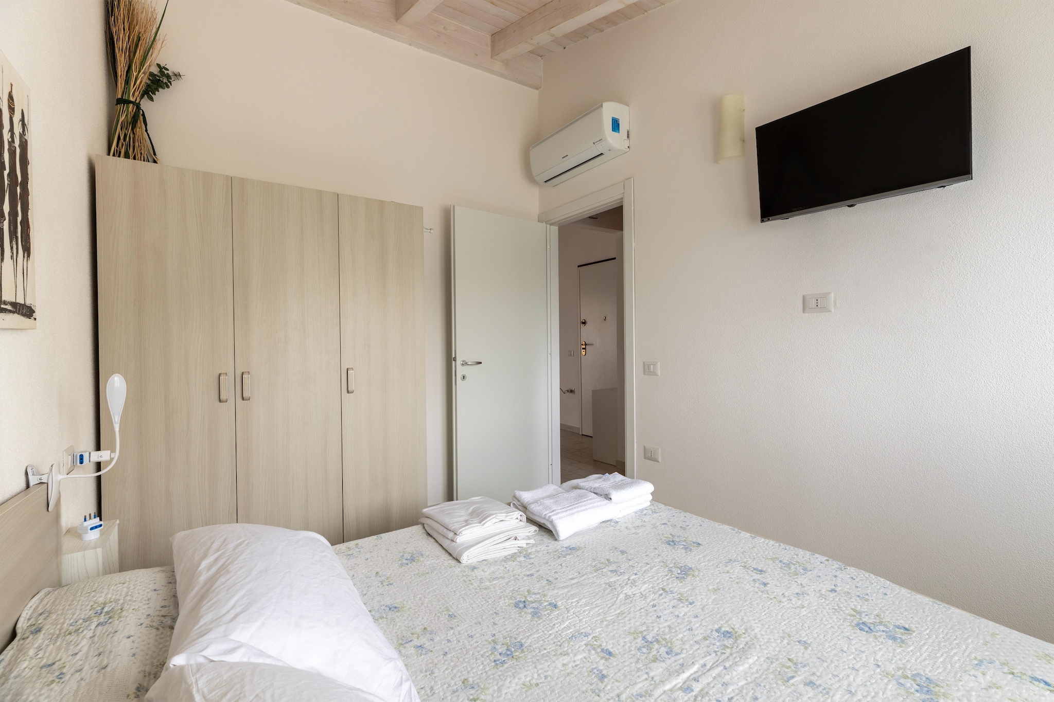 ATTICO BADESI CON PISCINA-Bedroom