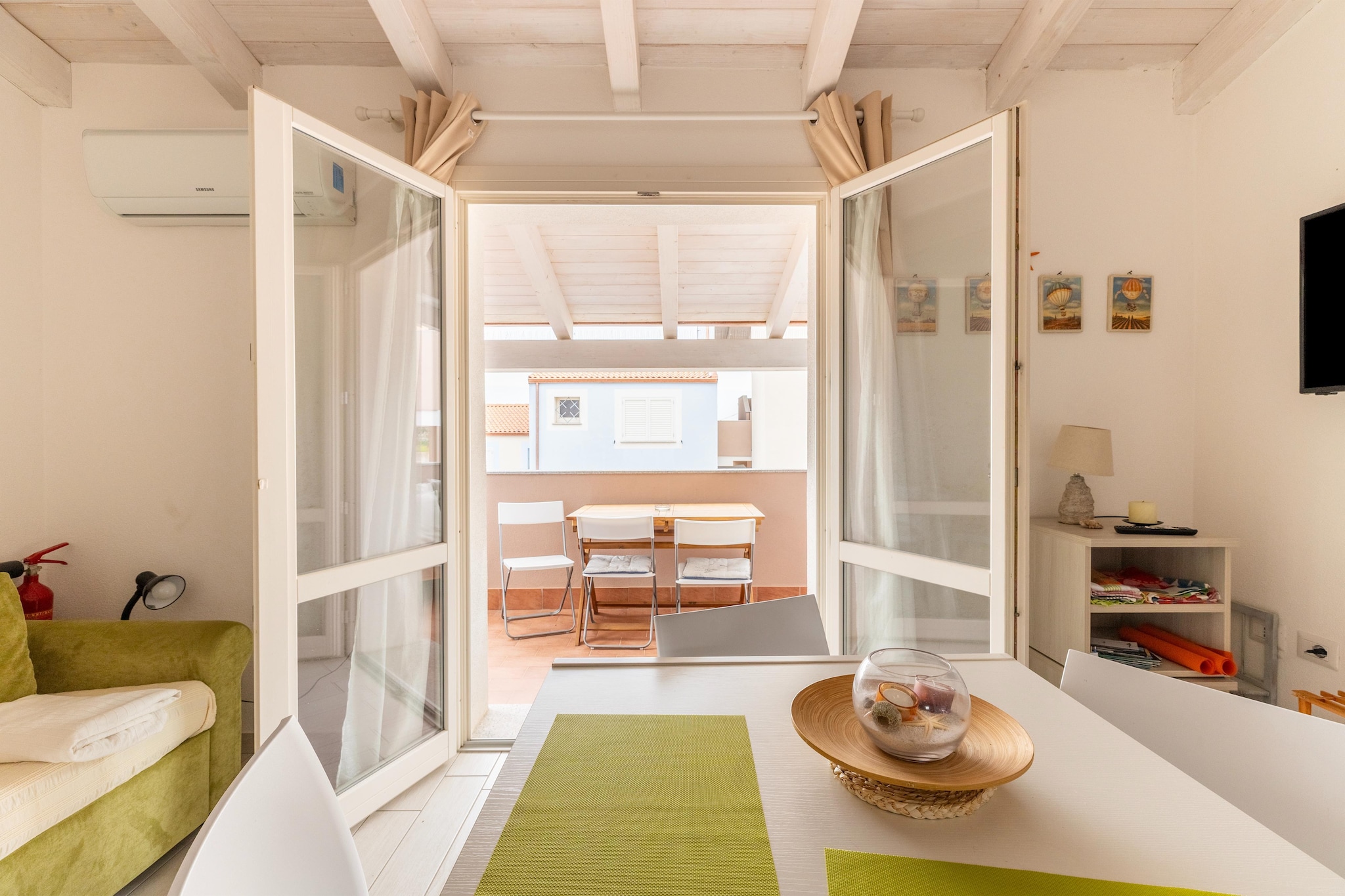 ATTICO BADESI CON PISCINA-Dining room