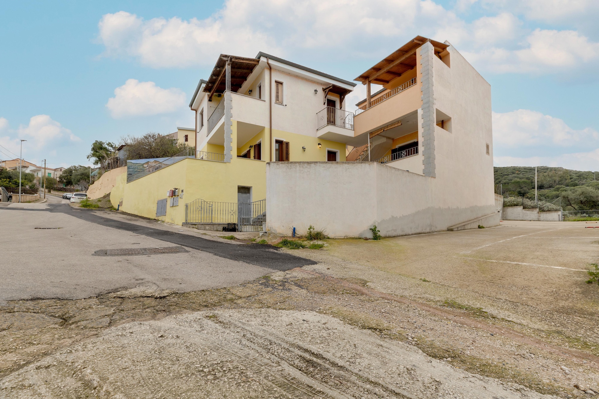 ATTICO BADESI CON PISCINA-Exterior in summer