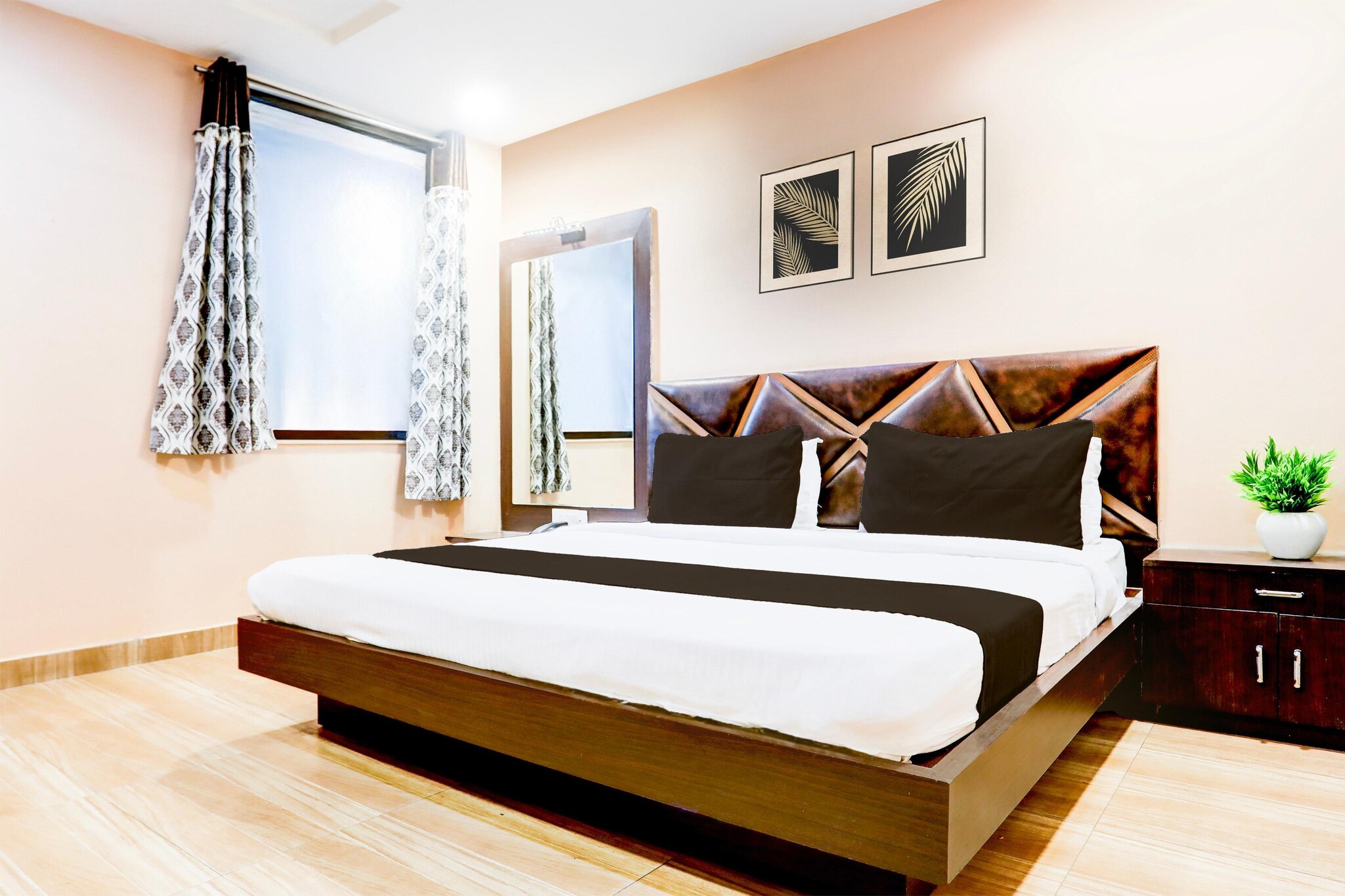 Comfortable Accommodations: Super Collection O Kampoo Tiraha Road in Gwalior offers family rooms with air-conditioning, private bathrooms, work desks, and free WiFi throughout the property. Each room includes a seating area, TV, and free toiletries.

Convenient Facilities: Guests enjoy a lounge, lift, 24-hour front desk, shared kitchen, housekeeping service, room service, meeting rooms, and luggage storage. Free on-site parking is available.

Prime Location: Located 15 km from Gwalior Airport, the hotel is near attractions such as Jai Vilas Palace (3 km), Gwalior Railway Station and Sasbahu Temple (5 km each), and Gwalior Fort (6 km).

Guest Satisfaction: Guests appreciate the attentive staff, comfortable rooms, and cleanliness.


Unmarried couples are warmly welcome at this property.

Guests with local ID proof are warmly welcome.

Early Check-In Policy: A full day’s room rate will be charged for check-ins before 6:00 AM. Complimentary early check-in is available between 6:00 AM and 10:00 AM, subject to room availability.
Check-in is only available to guests aged 18 and above. Please provide a government-issued ID to confirm your age.
