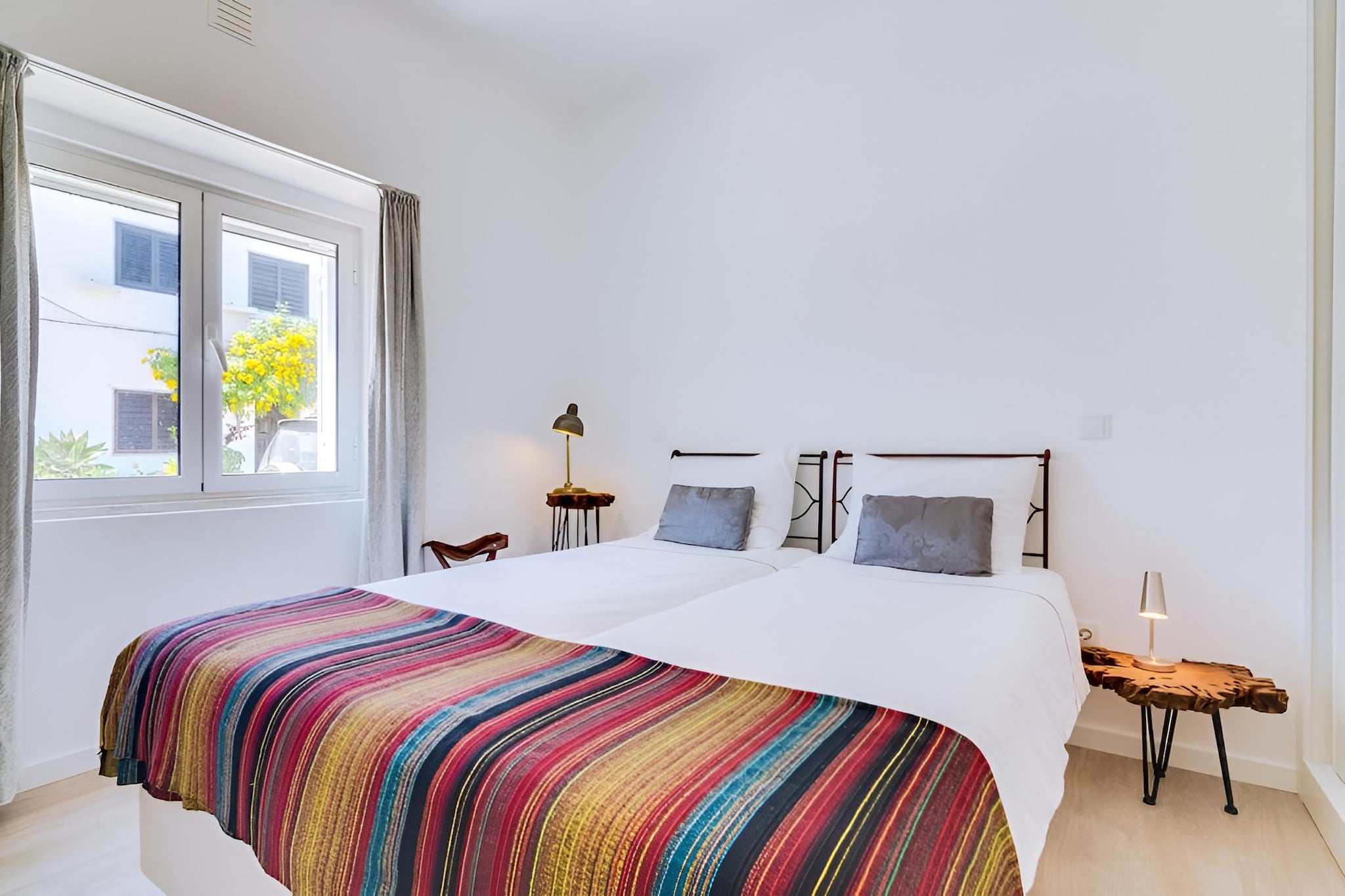Tucked into a quiet corner of Olhão, this intimate villa offers a calm and private escape designed for couples or solo travellers seeking comfort with a touch of outdoor living. With its enclosed garden and relaxed atmosphere, the home creates a peaceful setting while keeping you close to the Algarve’s coastline and local life.

Inside, the space is thoughtfully arranged with a bright and functional layout. The living area provides a comfortable spot to unwind, while the fully equipped kitchen includes modern essentials such as an oven, dishwasher, microwave, and coffee machine - making everyday cooking simple and convenient. The villa features one spacious bedroom with a comfortable double bed, along with a modern bathroom fitted with a shower, ensuring a restful and practical stay. Amenities such as Wi-Fi, air conditioning, heating, and private parking further enhance the ease of your stay.

Step outside into your private garden, where outdoor seating and a barbecue area invite slow mornings, relaxed afternoons, and quiet evenings under the open sky. The enclosed outdoor space adds a sense of privacy and comfort, making it perfect for unwinding after a day of exploring.

From here, Olhão’s charm unfolds effortlessly. The harbour, local markets, and the stunning landscapes of the Ria Formosa Natural Park are all within easy reach, offering opportunities for boat trips, coastal walks, and fresh seafood dining. Whether you’re seeking relaxation or exploration, this villa provides a simple yet well-appointed base for experiencing the Algarve at your own pace.