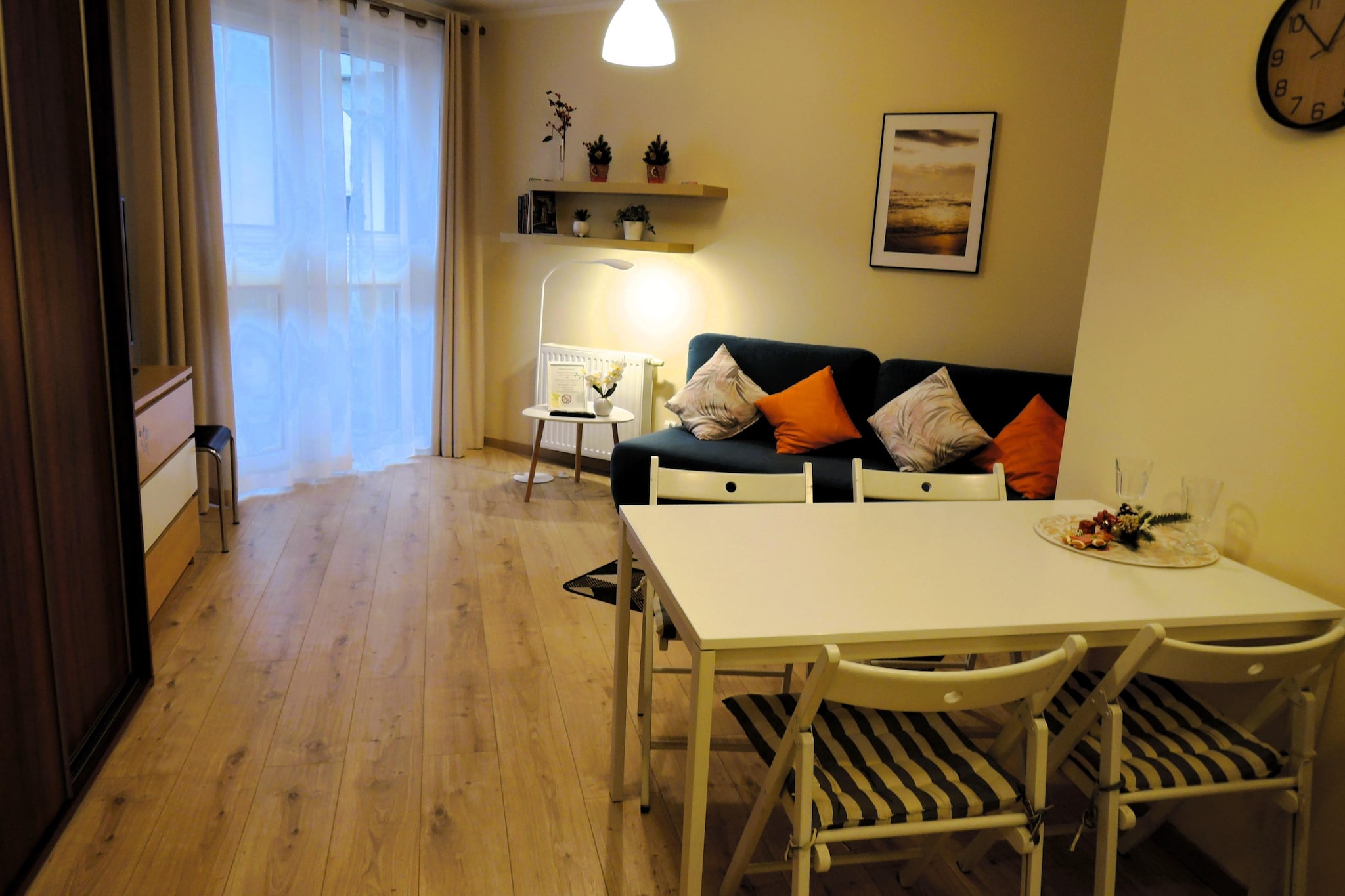 On the 2nd floor: (open kitchen(electric kettle, boiling water tap, toaster, cooker(4 ring stoves, induction), hood, espresso machine, oven, microwave, dishwasher, fridge-freezer), Living/bed room(double sofa bed, TV, dining table, seating area), bedroom(double bed), bathroom(shower, washbasin, toilet, washing machine))\n\nInternet access, balcony, lift, iron