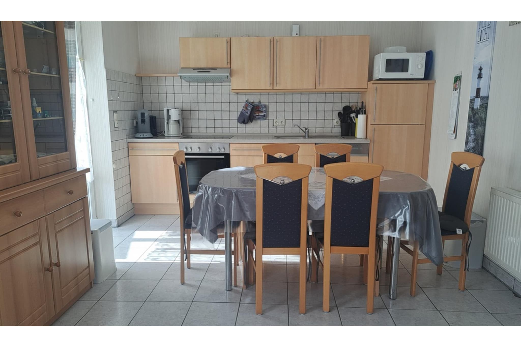 Ground floor: (open kitchen(hob(4 ring stoves), electric kettle, toaster, coffee machine, oven, microwave, dishwasher, fridge-freezer, Hand blender), Living/diningroom(TV, dining table, seating area, radio, stereo unit), bedroom(double bed, TV), bathroom(shower, washbasin, toilet))\n\nOn the 1st floor: (bedroom(double bed, TV), bedroom(single bed, single bed, TV), bathroom(shower, washbasin, toilet))\n\ncarport, washing machine, heating, terrace, garden, bicycle storage, bicycle storage, garden furniture, BBQ, parking, slide, high chair, baby crib(free)