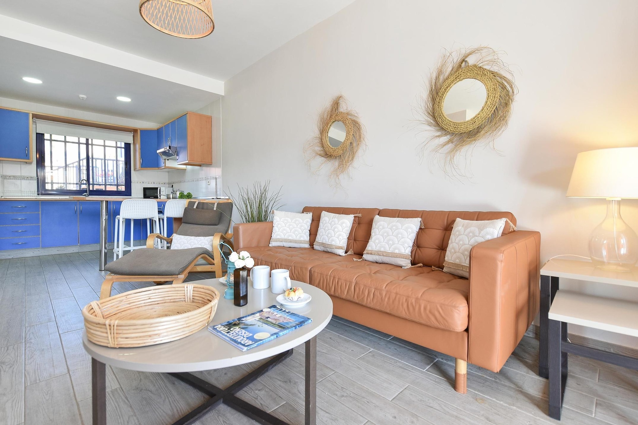 Nestled within the tranquil complex in the sunny south of Gran Canaria, this two-storey duplex offers an enchanting escape where comfort meets the coast. Your stay begins in the bright, open-plan living area, where large doors draw you out onto a private terrace—the perfect spot to lounge on sunbeds with a cool drink. Whether you are whipping up a Mediterranean feast in the fully equipped kitchen (complete with an espresso machine and dishwasher) or relaxing in front of the Smart TV, the full air conditioning ensures your indoor moments are just as refreshing as the island breeze.

The upper floor is designed for restful nights and slow mornings. The master bedroom serves as a private sanctuary, featuring a charming balcony where you can soak in the early sun before the rest of the world wakes up. A second bedroom with twin beds and two modern bathrooms with showers provide ample space and privacy for up to four guests. Every detail, from the washing machine to the high chair and cot for little travelers, has been thoughtfully included to make you feel completely at home.

Beyond your private garden, the complex invites you to dive into its large shared swimming pool or wander through beautifully landscaped common areas. The location is truly unbeatable for explorers; Meloneras Beach is just a short stroll away, and the iconic promenade offers a scenic walk directly into the heart of the Maspalomas resort. At this property, you aren't just booking a flat; you are securing a front-row seat to the best leisure, shopping, and golden sunsets Gran Canaria has to offer