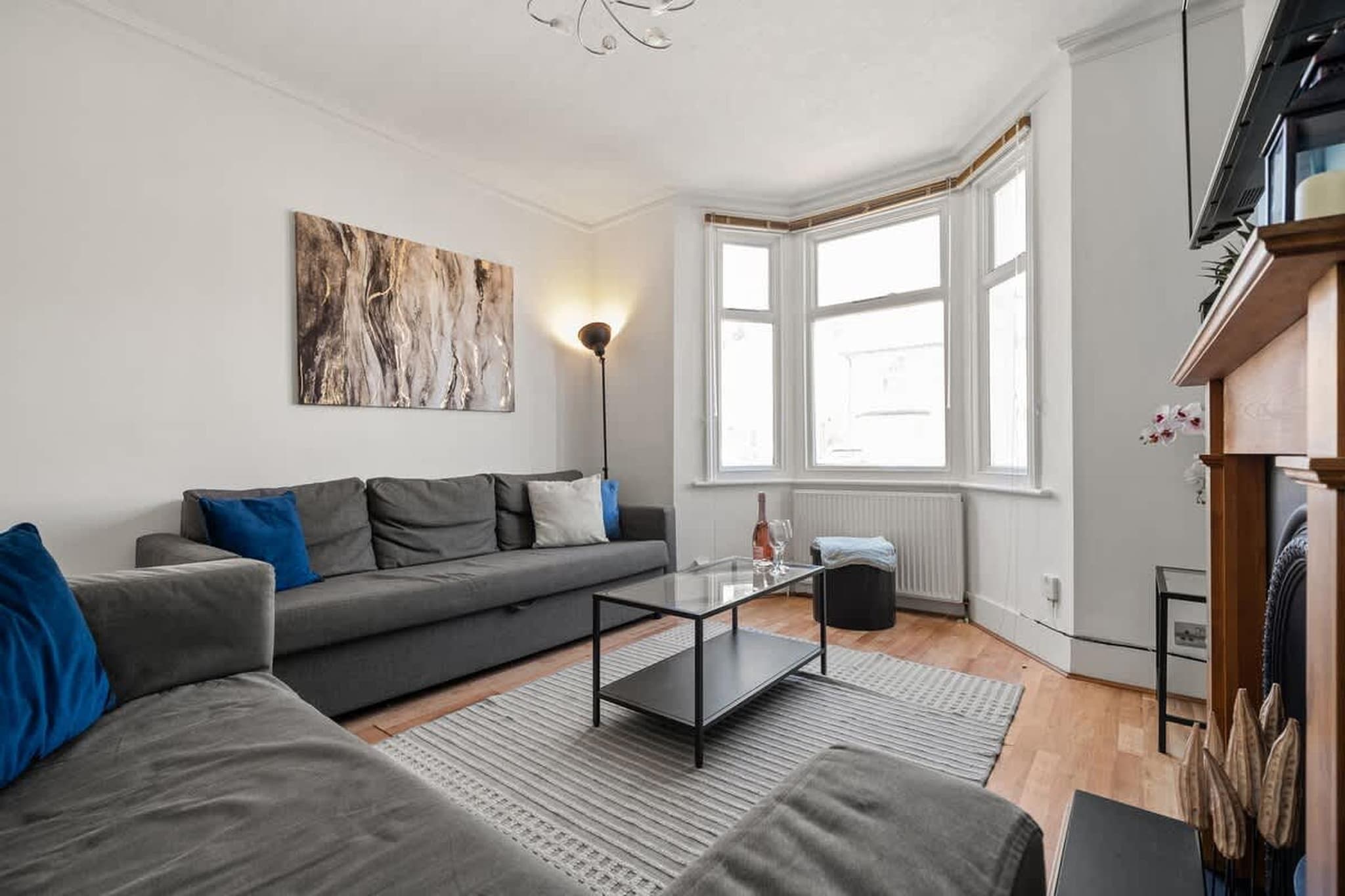 Built in a calm residential pocket of Greater London, this spacious townhouse offers a relaxed base for groups and families who want comfort, space, and easy access to the capital. Designed to host up to nine guests, the home combines practical living areas with restful bedrooms and a private outdoor space for downtime between city explorations.

The living room welcomes everyone with comfortable seating, a TV, and a double sofa bed, making it a natural gathering spot for evenings in. A separate dining room with a large table encourages shared meals and conversations, while the well-equipped open kitchen makes self-catering simple for larger groups. Sleeping arrangements are thoughtfully spread across four bedrooms. One bedroom features two single beds, two bedrooms each offer a double bed, and another provides a single bed, giving flexibility for mixed groups. Three fully functional bathrooms with bathtubs help mornings run smoothly, even with a full house.

Step outside to enjoy the private garden and terrace - ideal for morning coffee, fresh air breaks, or relaxed evenings. Added comforts such as Wi-Fi, heating, washer-dryer, a high chair, dedicated workspace, and public parking make this home suitable for both short stays and longer visits.

From here, you can easily head into central London to explore iconic sights, stroll through Greenwich Park for panoramic views, unwind among the deer in Richmond Park, or spend a day discovering museums, markets, cafés, and riverside walks across the city. This townhouse offers the calm of a neighbourhood stay with the excitement of London just a short journey away.